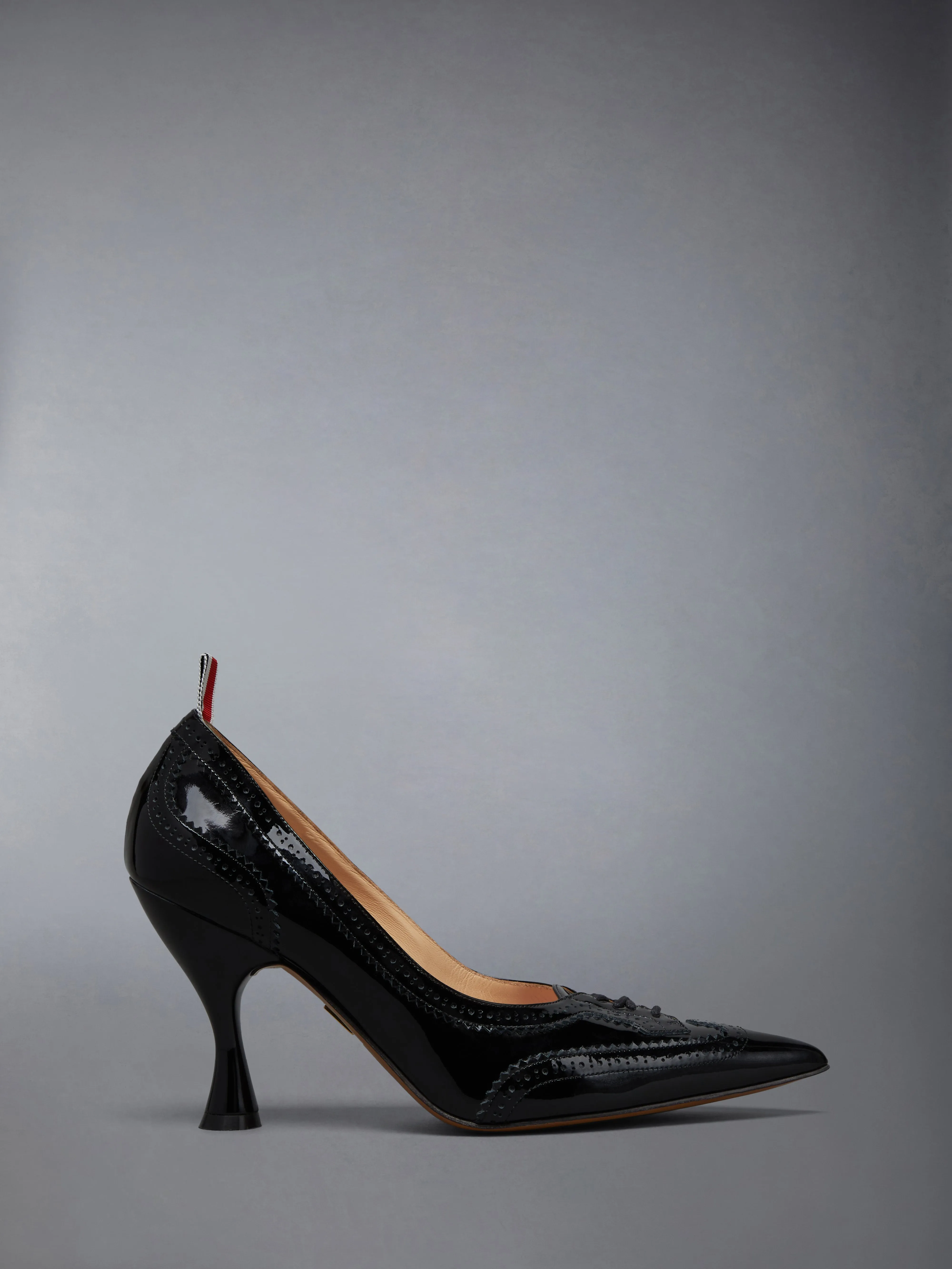 SOFT PATENT WINGTIP PUMP 90MM sold by Thom Browne