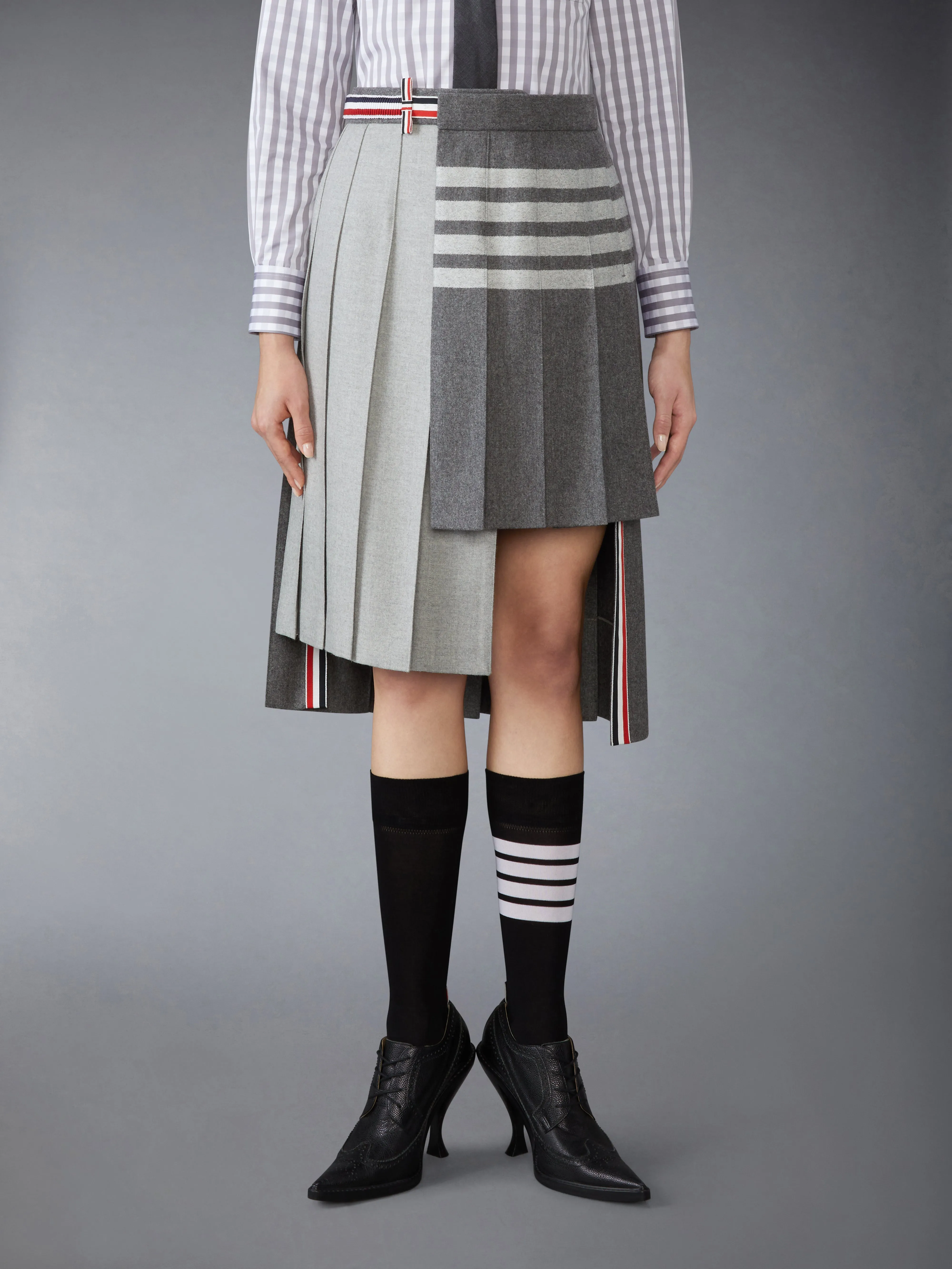 WOOL FLANNEL 4-BAR PLEATED SKIRT sold by Thom Browne