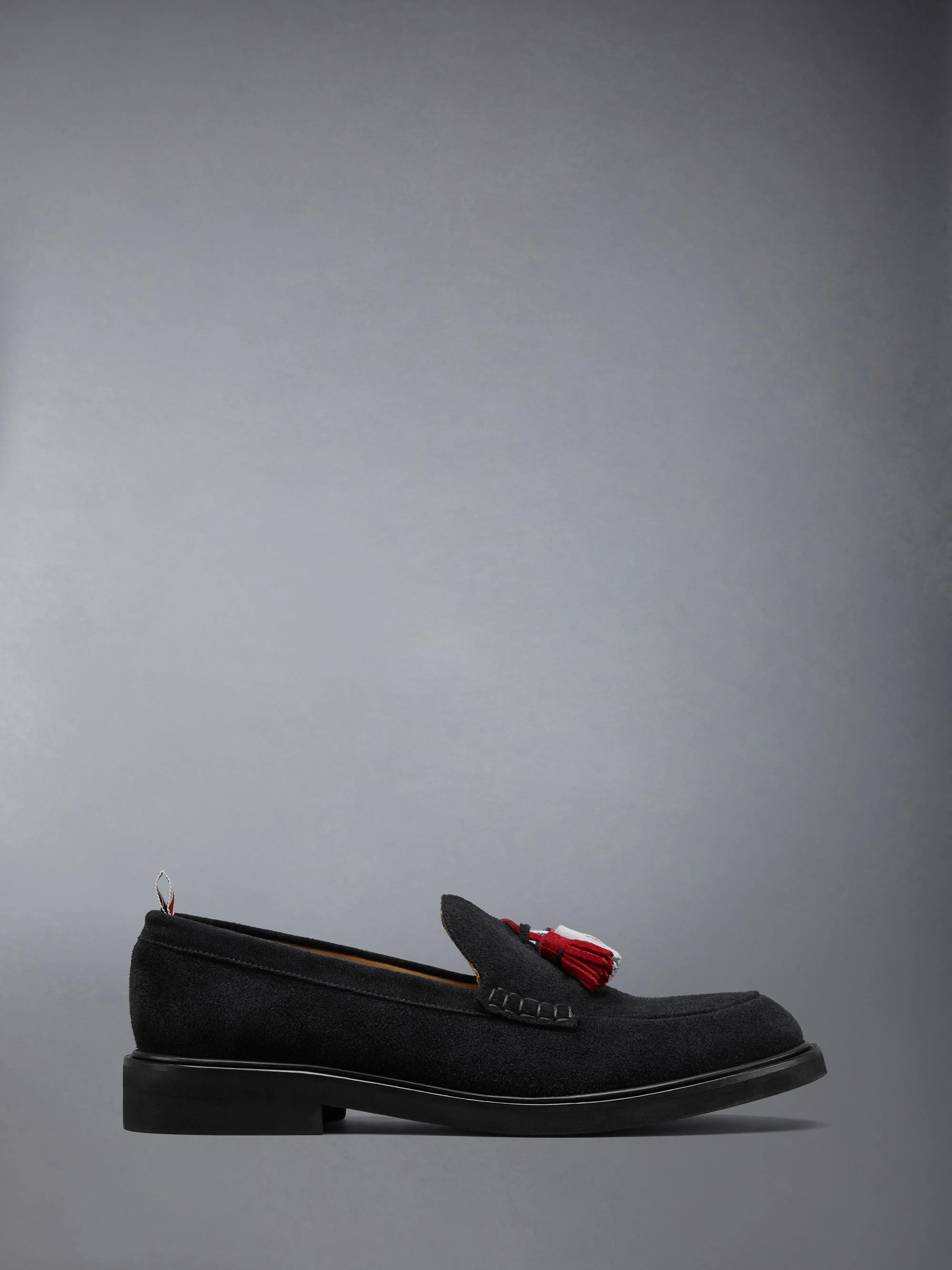 CALF SUEDE RWB TASSEL LOAFER sold by Thom Browne