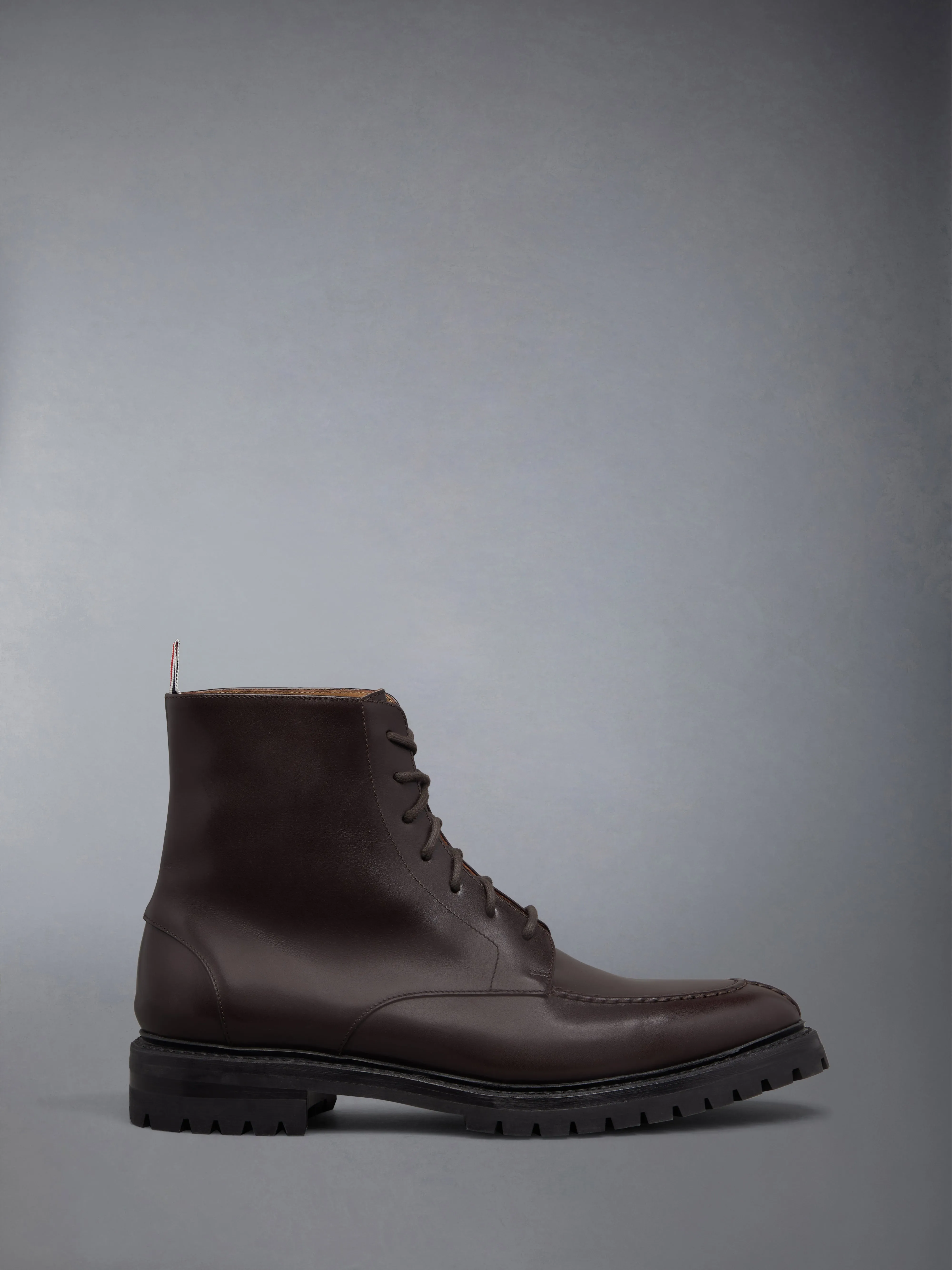 BOX CALF COMMANDO SOLE APRON STITCH BOOT sold by Thom Browne