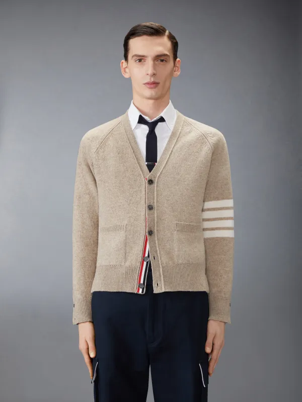 SHETLAND WOOL 4-BAR RELAXED FIT V NECK CARDIGAN sold by Thom Browne