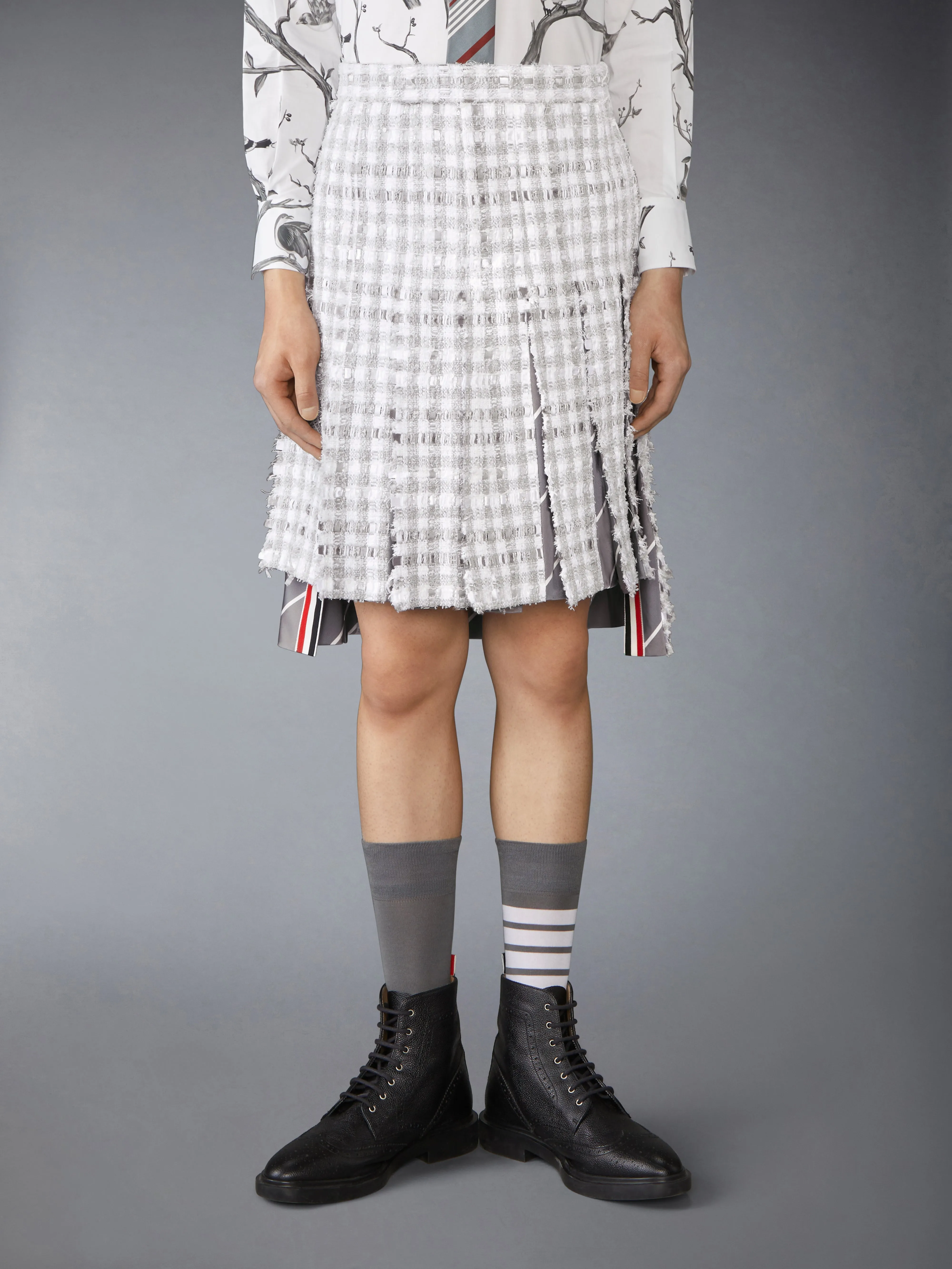 GINGHAM TWEED LOW RISE PLEATED SKIRT sold by Thom Browne