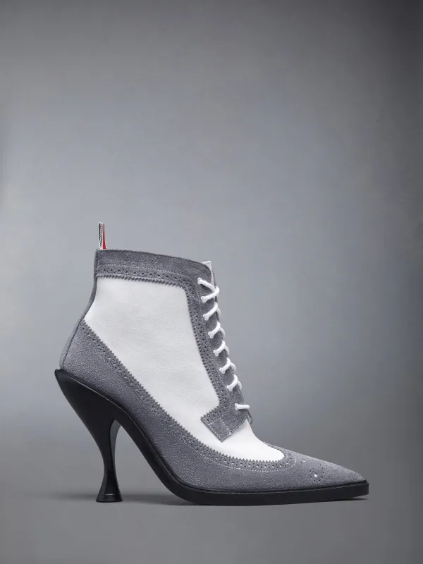 CALF SUEDE WINGTIP BOOT 90MM sold by Thom Browne