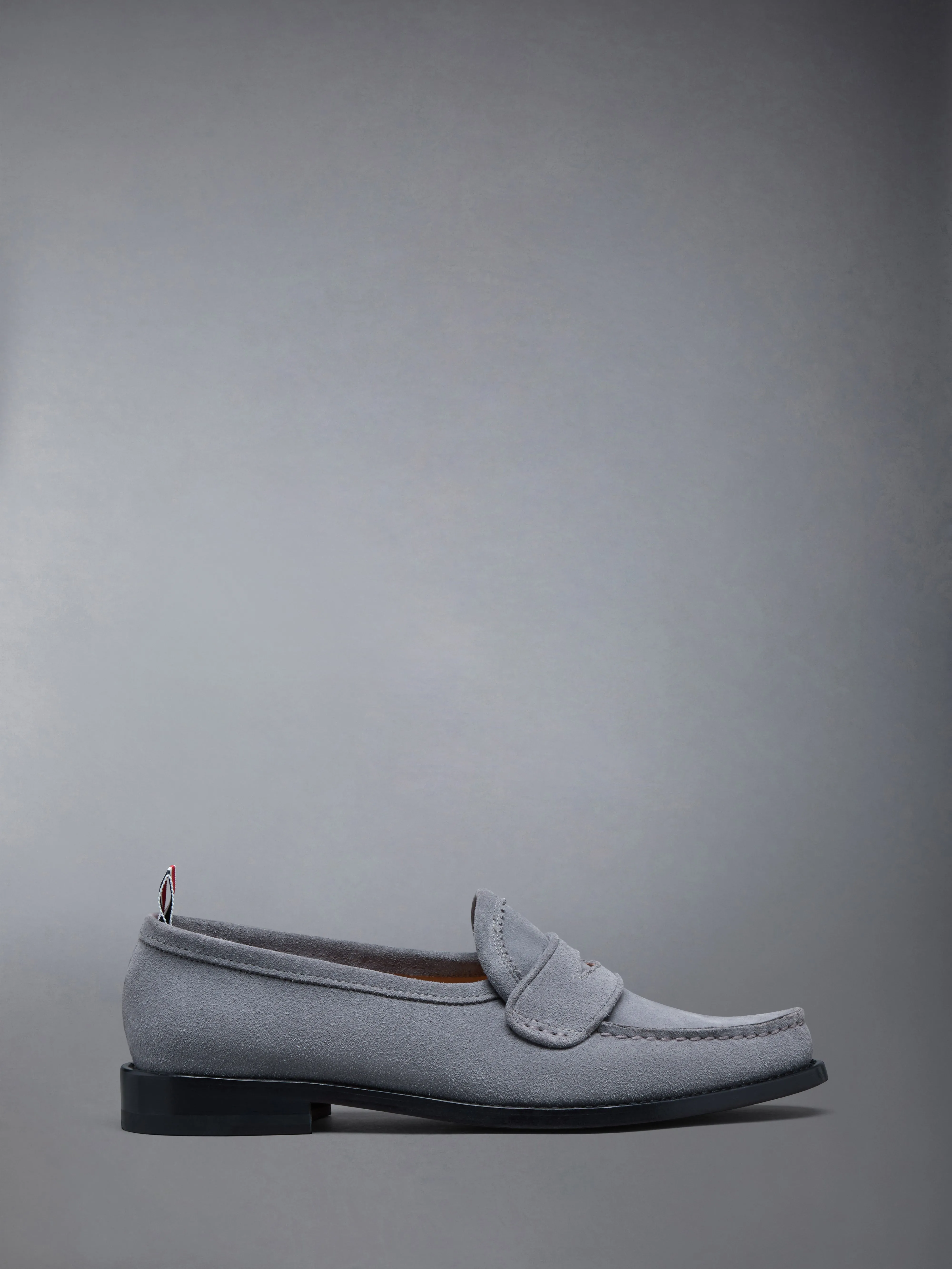 CALF SUEDE PLEATED VARSITY LOAFER sold by Thom Browne
