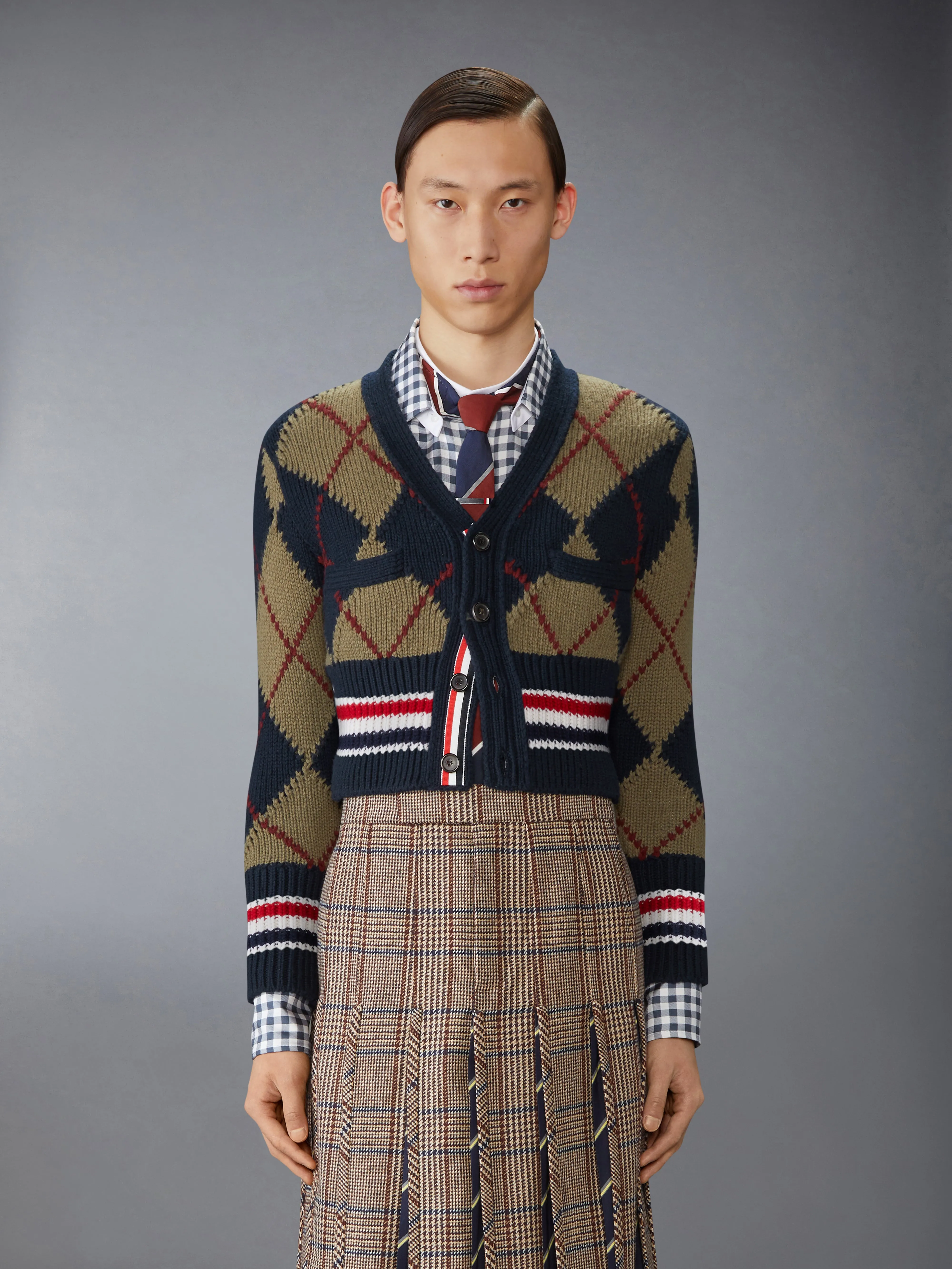 MERINO WOOL ARGYLE INTARSIA V NECK CARDIGAN sold by Thom Browne