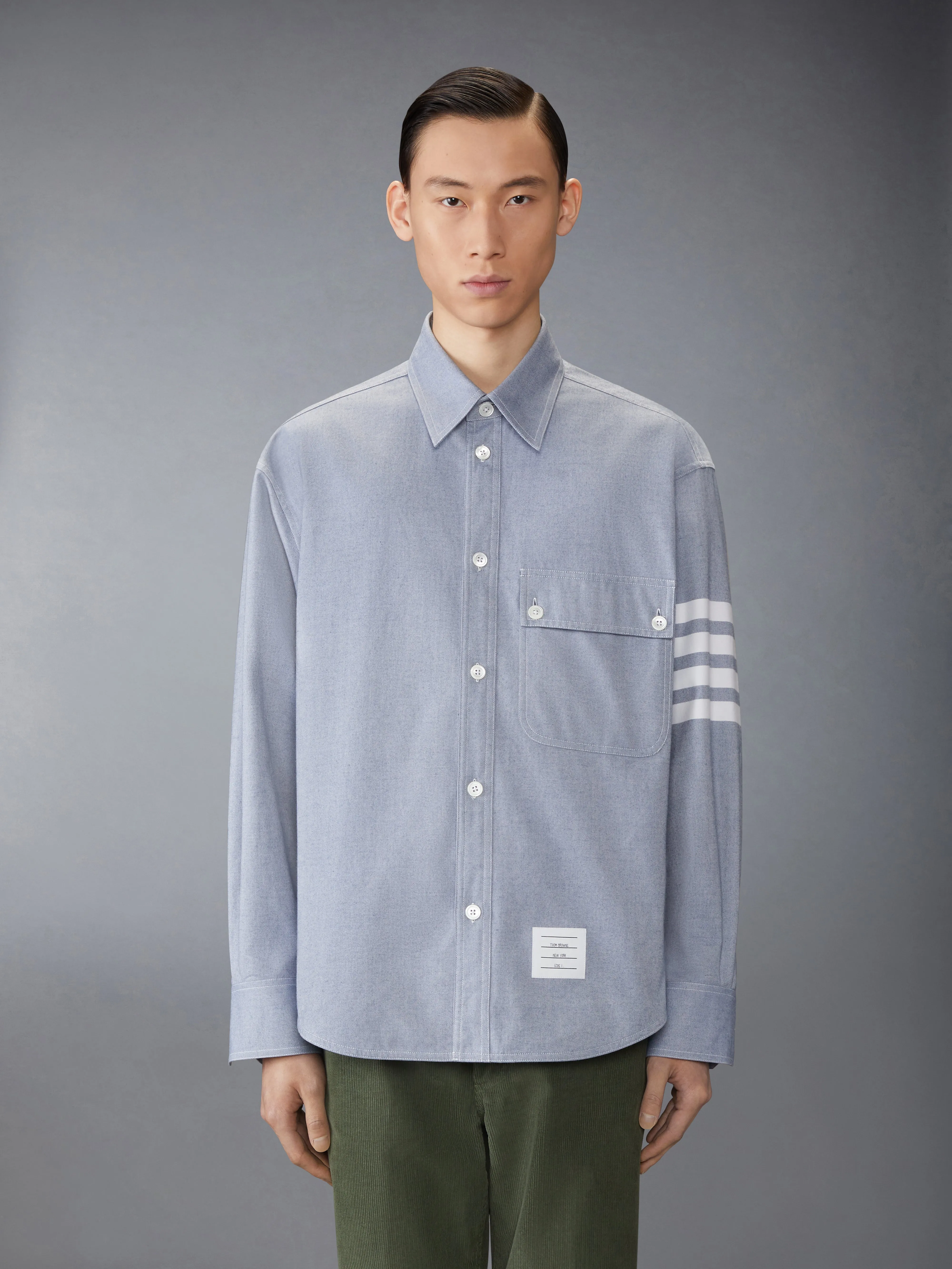 WOVEN FLANNEL 4-BAR OVERSIZED SHIRT sold by Thom Browne
