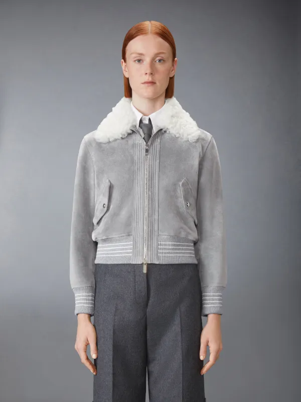SHEARLING & SUEDE CROPPED FLIGHT JACKET sold by Thom Browne