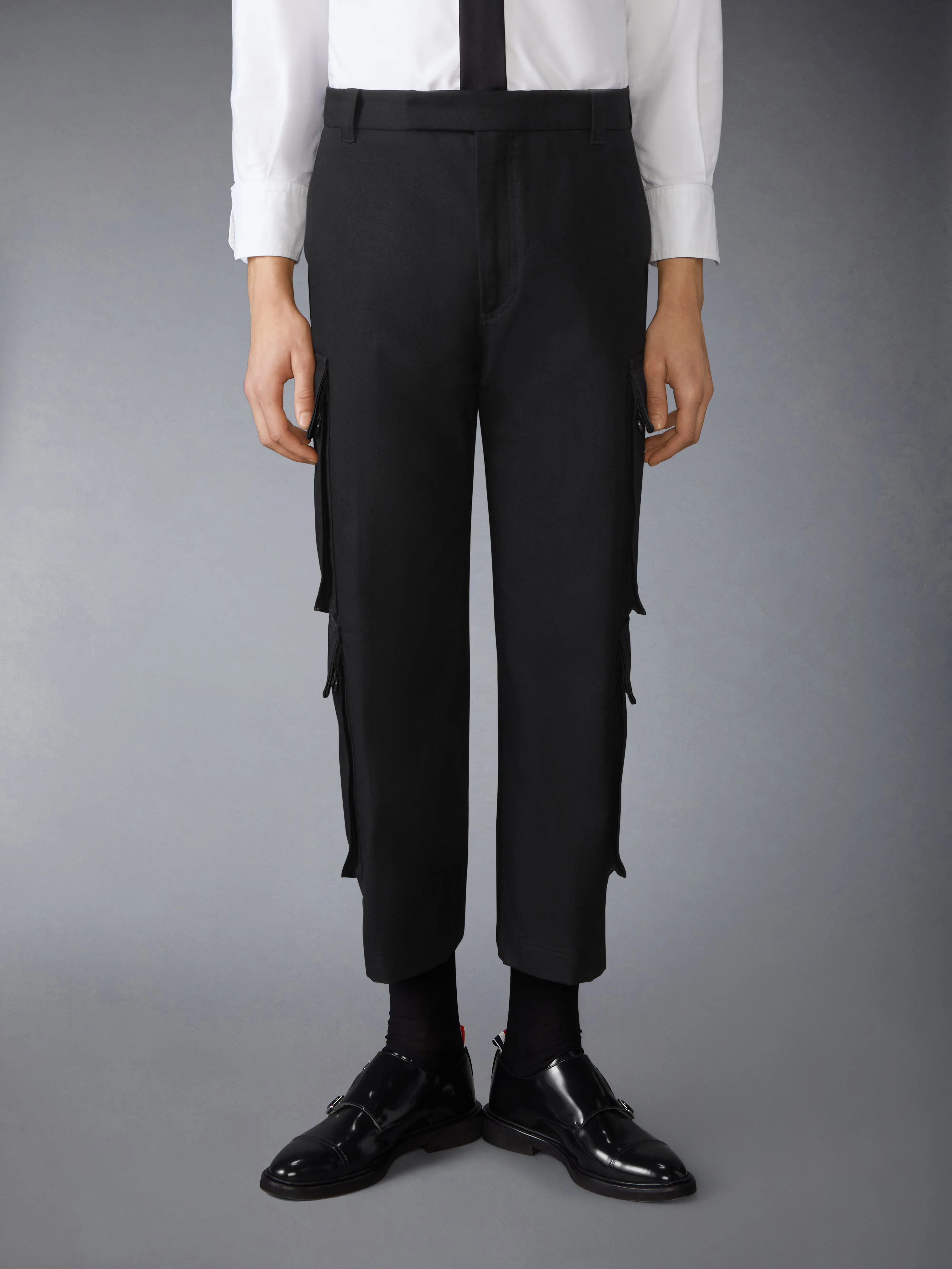WASHED COTTON UTILITY CHINO CARGO TROUSERS sold by Thom Browne