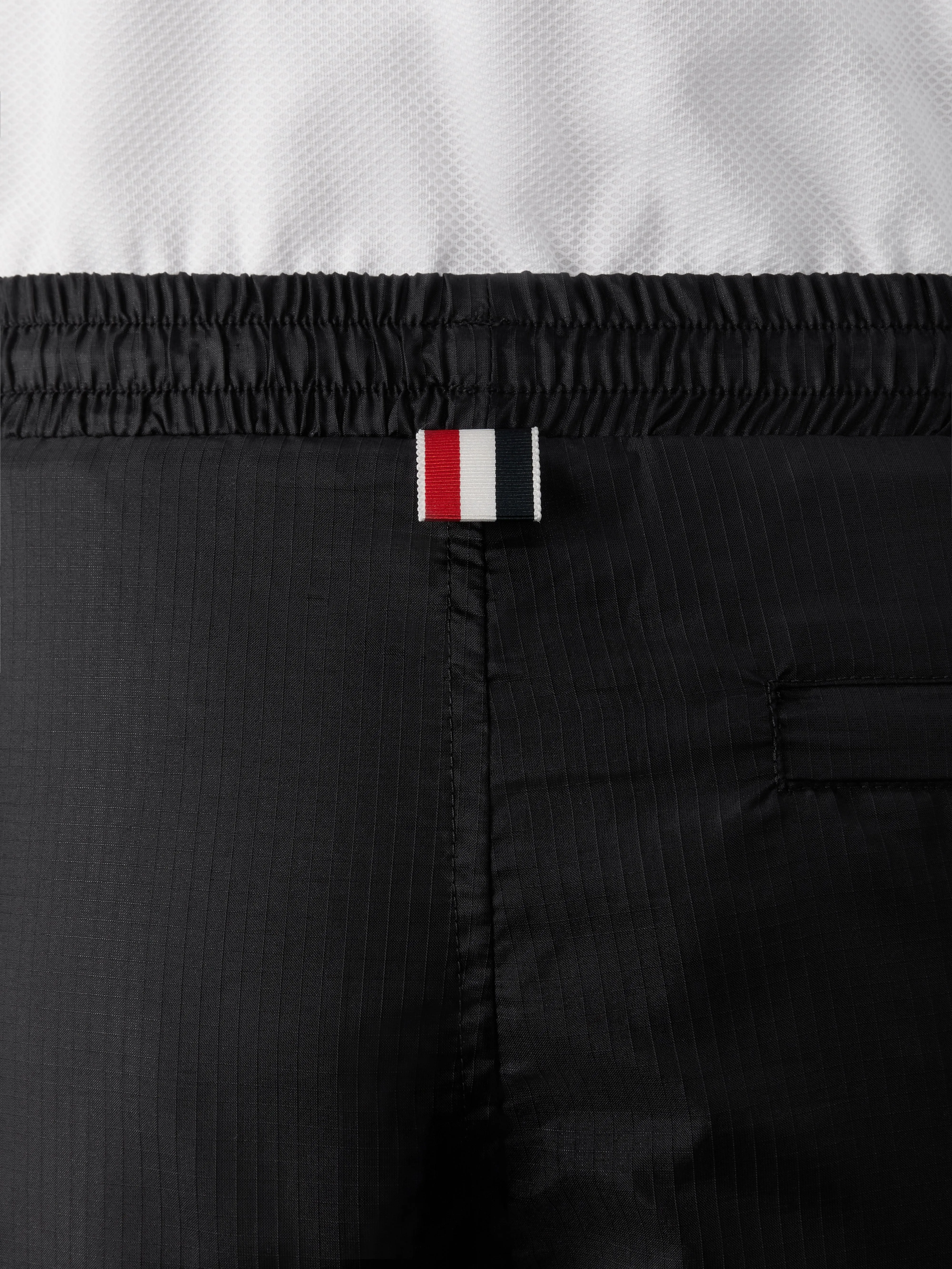 SHINY RIPSTOP 4-BAR TRACK PANTS sold by Thom Browne product image thumbnail 4