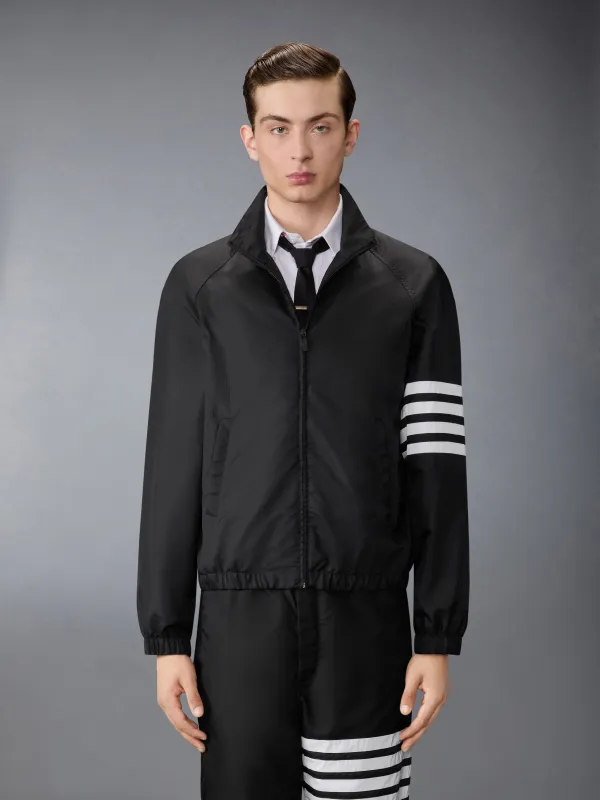 SHINY RIPSTOP RAGLAN 4-BAR TRACK JACKET made by Thom Browne