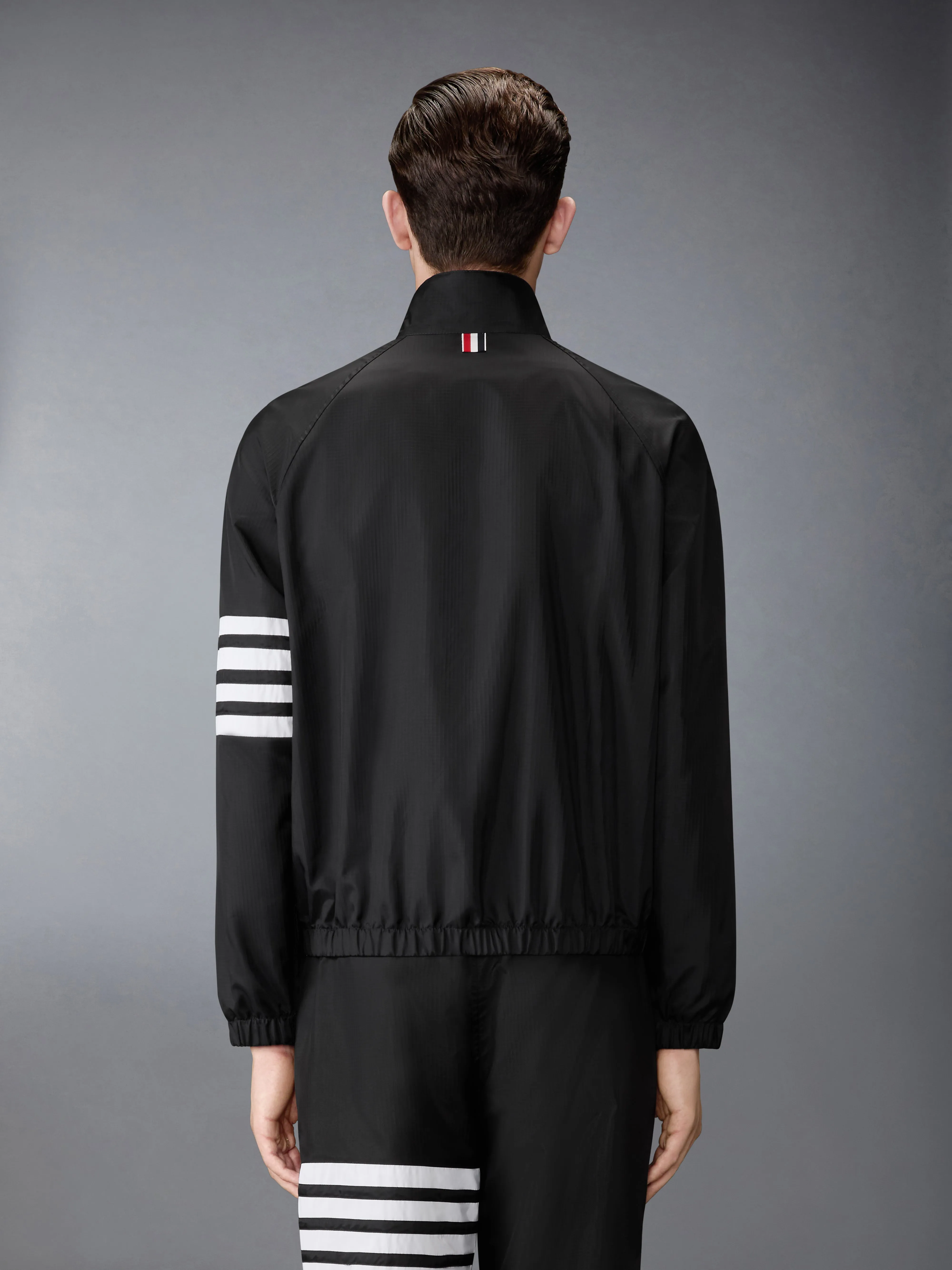 SHINY RIPSTOP RAGLAN 4-BAR TRACK JACKET sold by Thom Browne product image thumbnail 2