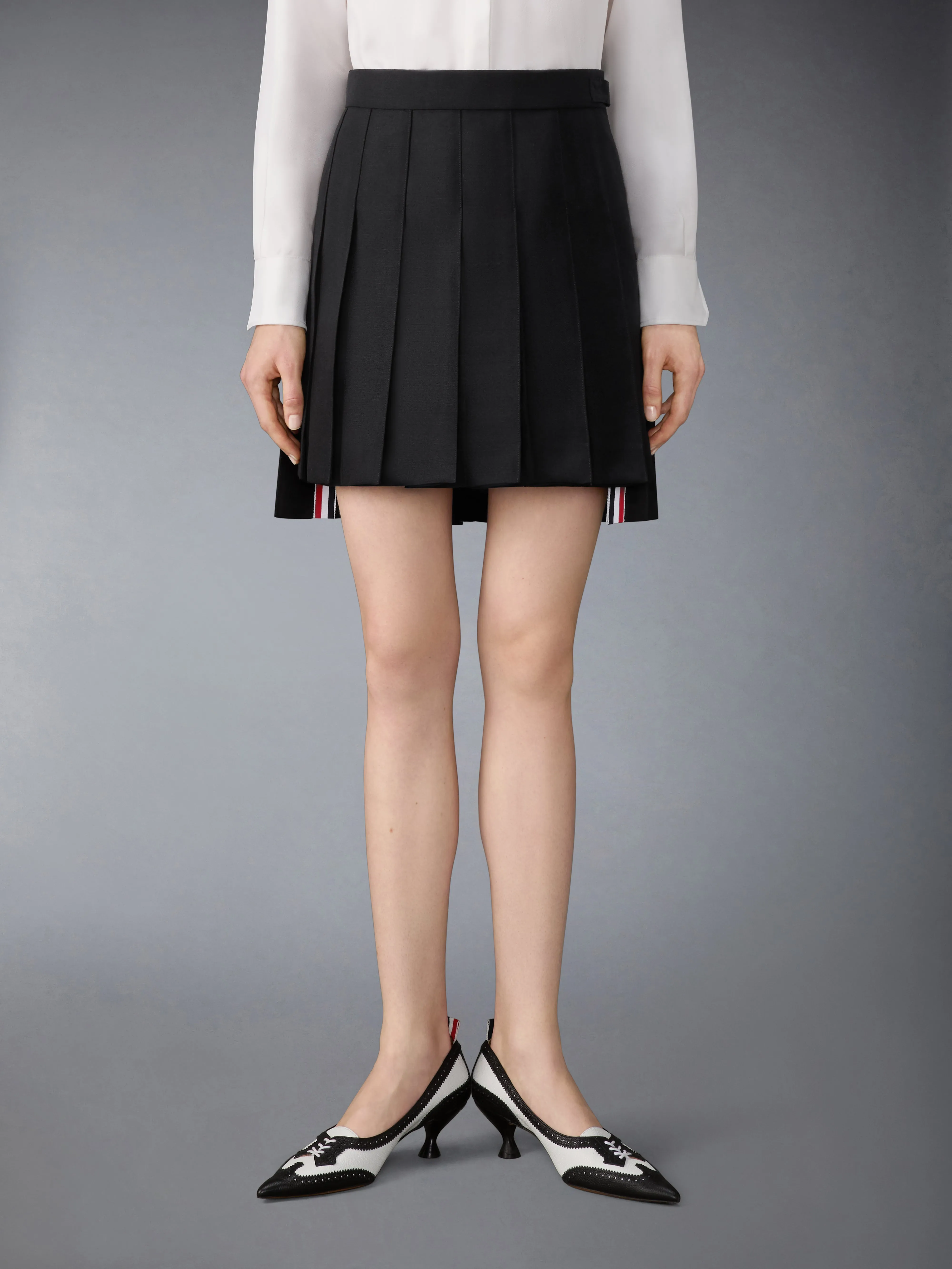 3-PLY WOOL MOHAIR PLEATED MINI SKIRT sold by Thom Browne