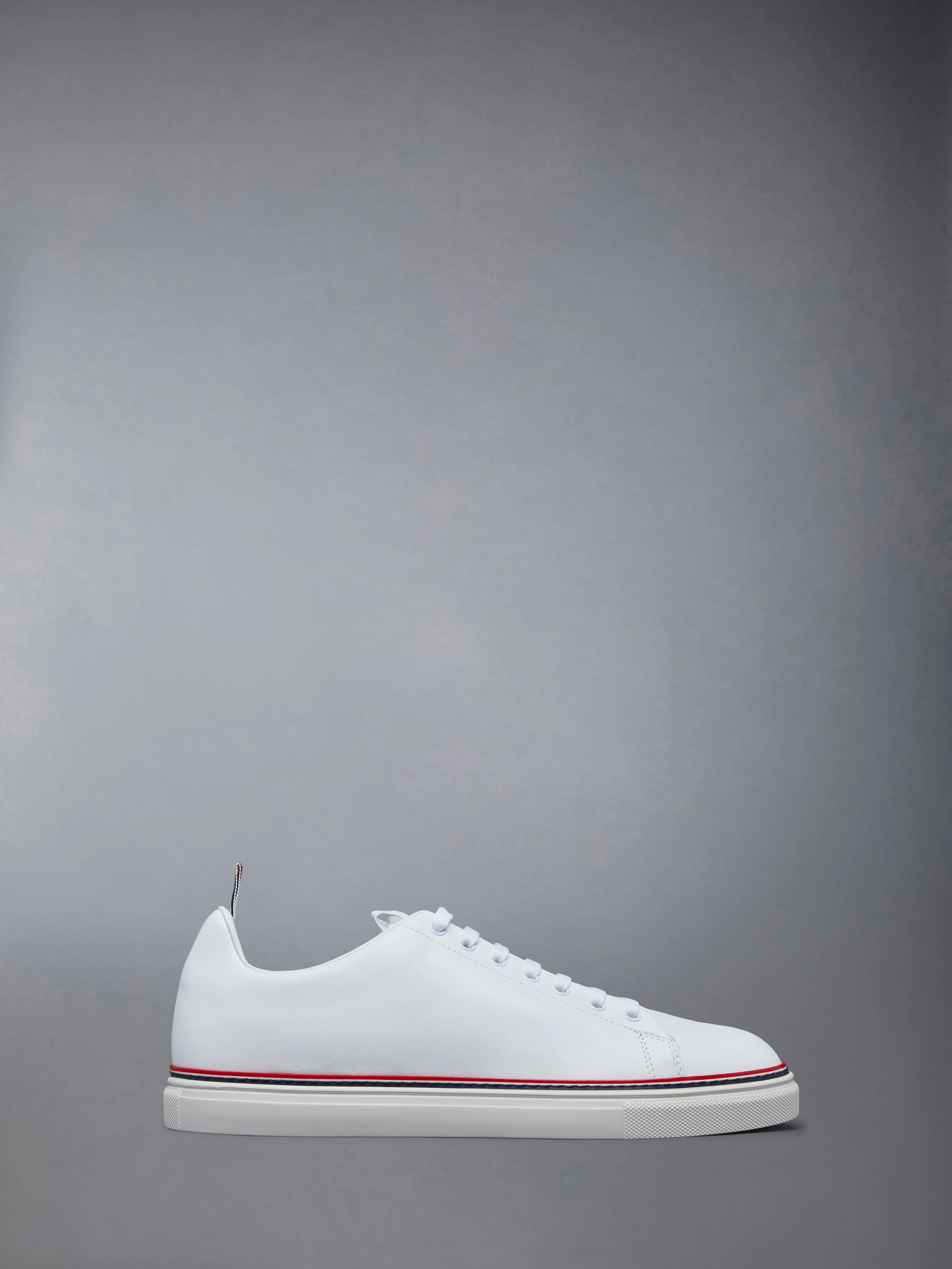 VITELLO CALF TENNIS SHOE sold by Thom Browne