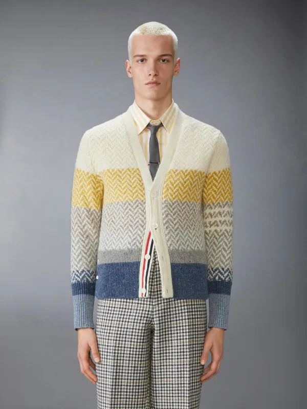 DONEGAL AND CUSHENDALE HERRINGBONE JACQUARD V NECK CARDIGAN sold by Thom Browne