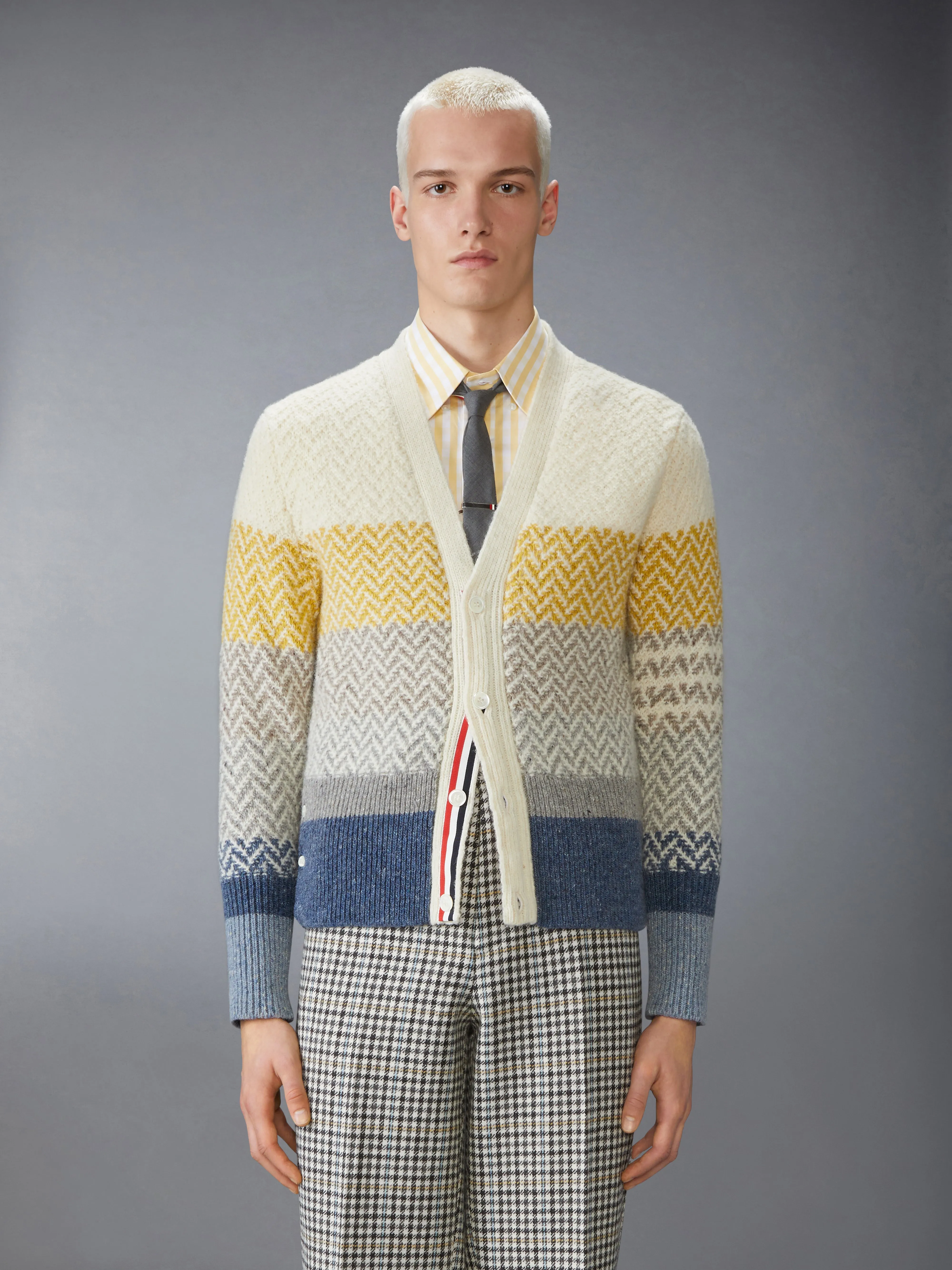 DONEGAL AND CUSHENDALE HERRINGBONE JACQUARD V NECK CARDIGAN sold by Thom Browne