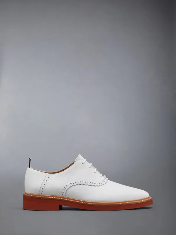 NUBUCK MICRO SOLE SADDLE SHOES sold by Thom Browne