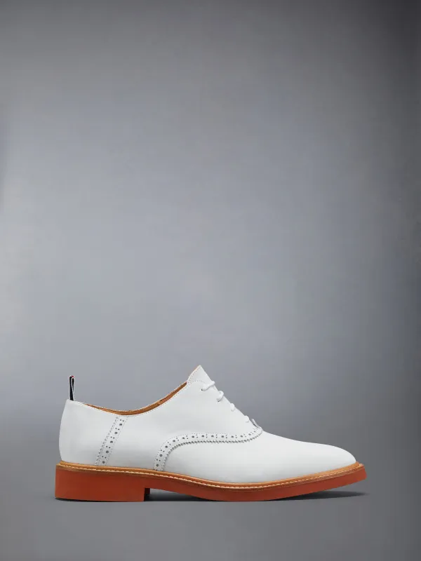 NUBUCK MICRO SOLE SADDLE SHOES sold by Thom Browne