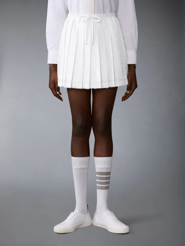 EYELASH TWEED DRAWSTRING PLEATED MINI SKIRT sold by Thom Browne