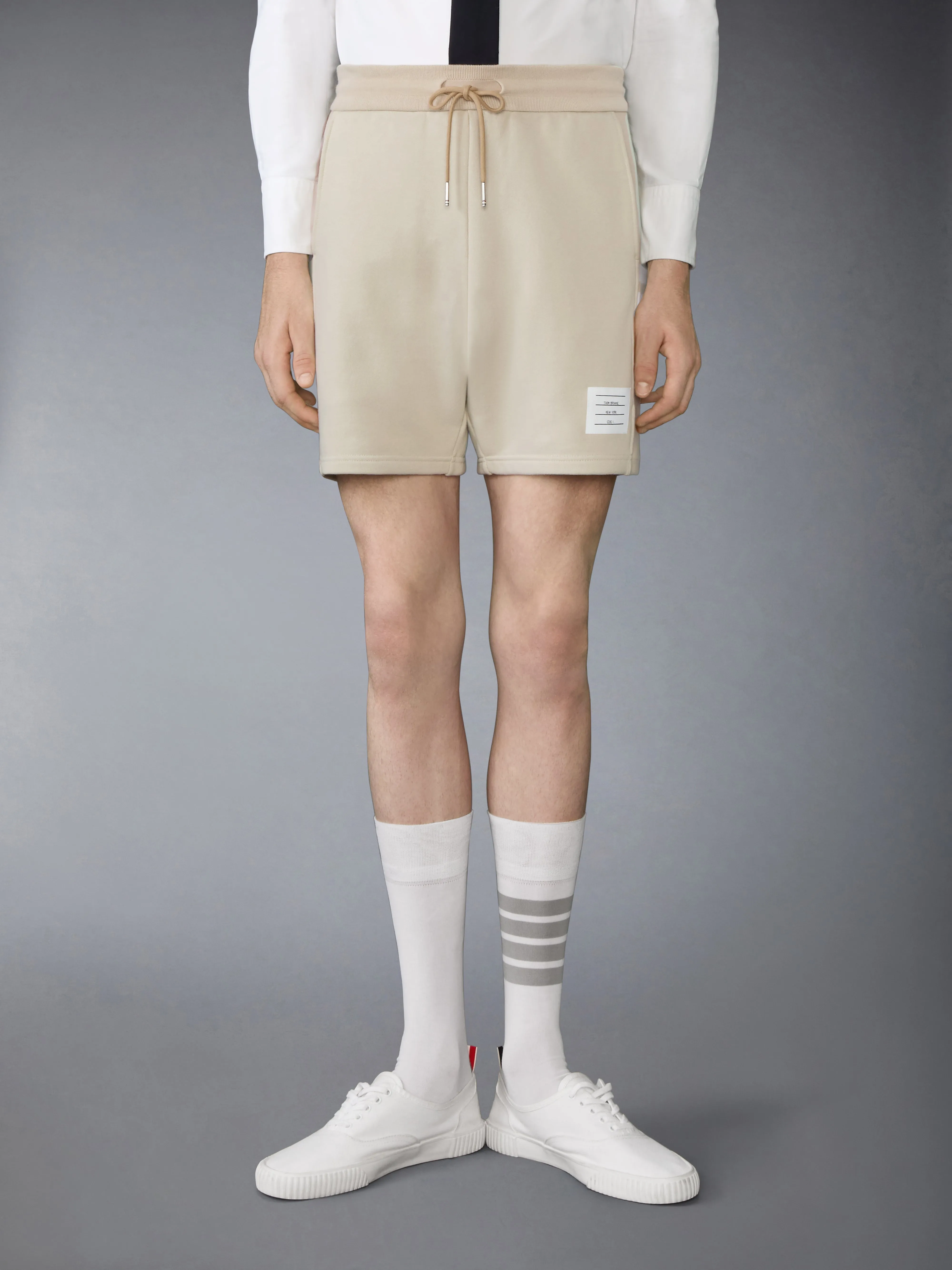 SOLID LOOPBACK JERSEY 4-BAR SWEATSHORTS sold by Thom Browne