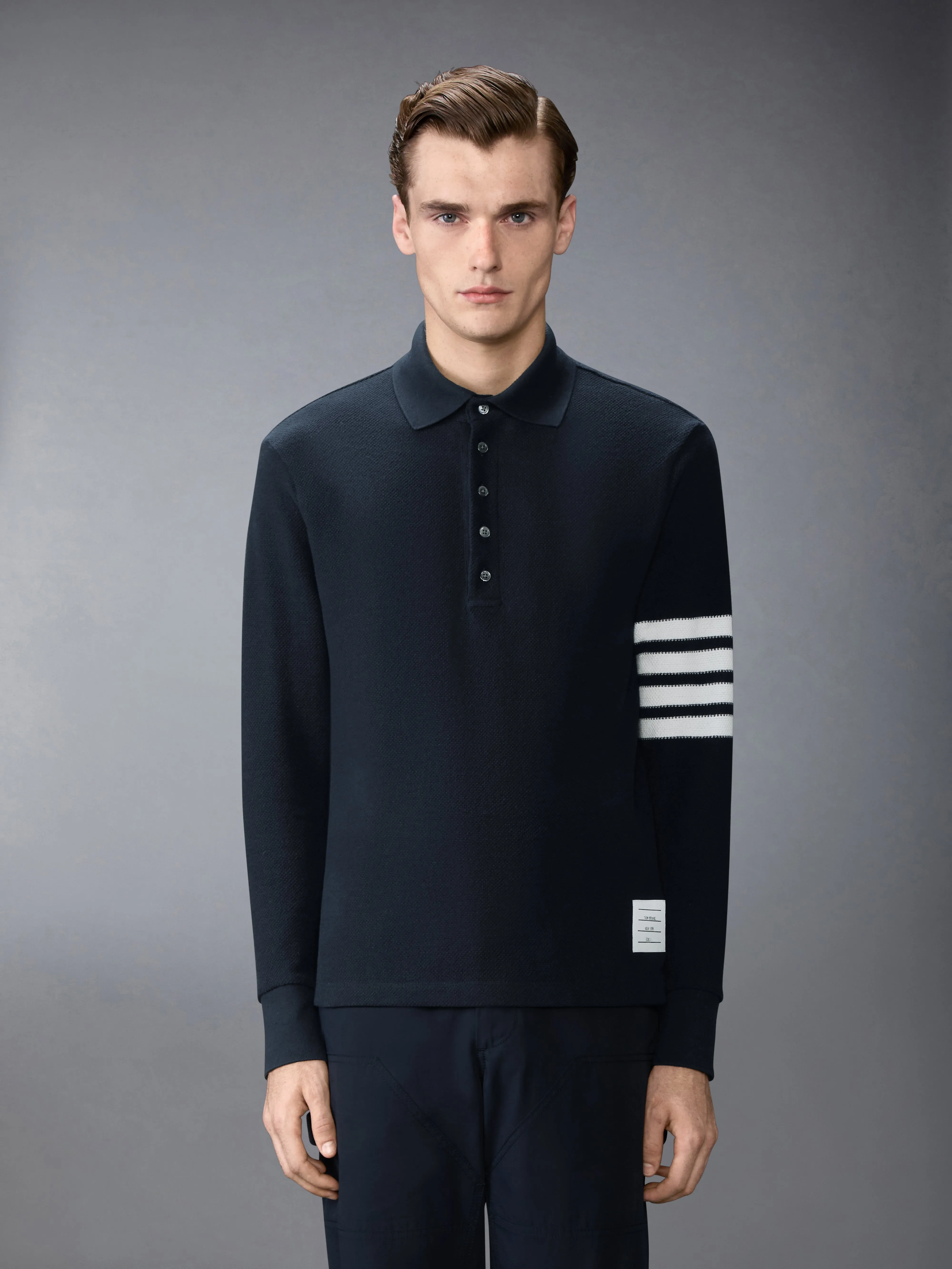 TEXTURED PIQUE 4-BAR LONG SLEEVE POLO sold by Thom Browne