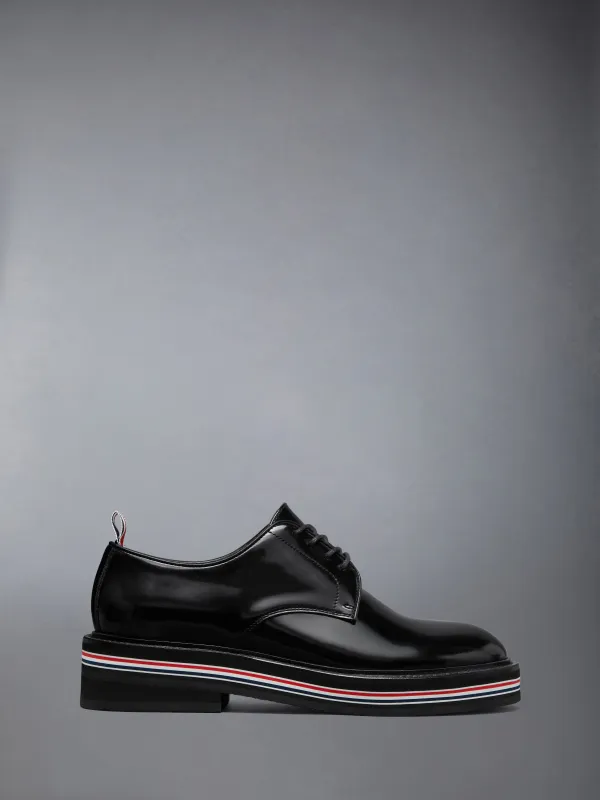 SOFT SPAZZOLATO RUBBER SOLE UNIFORM DERBY sold by Thom Browne