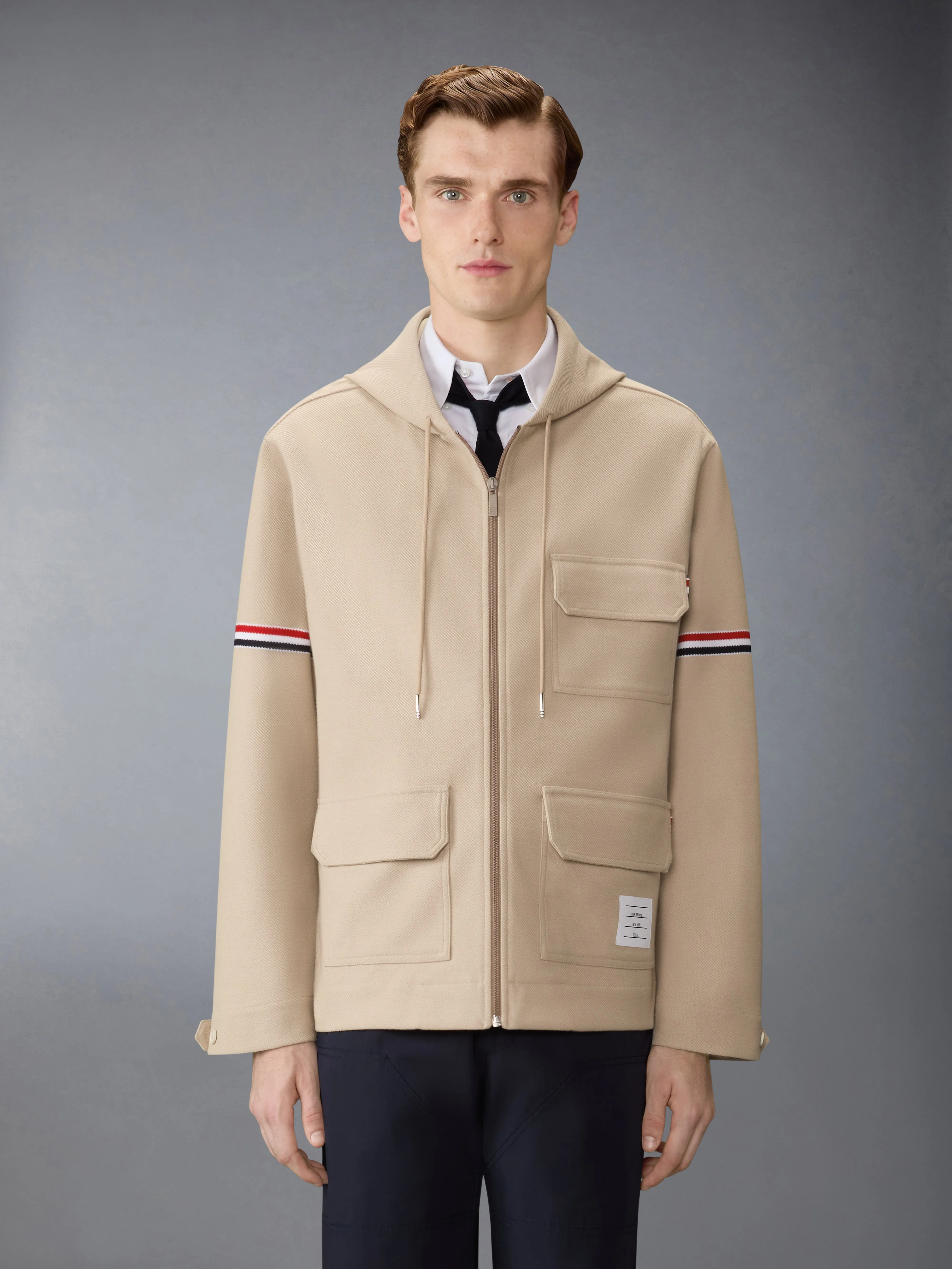 DOUBLE FACE TECH TWILL OVERSIZED ARMBAND PARKA sold by Thom Browne