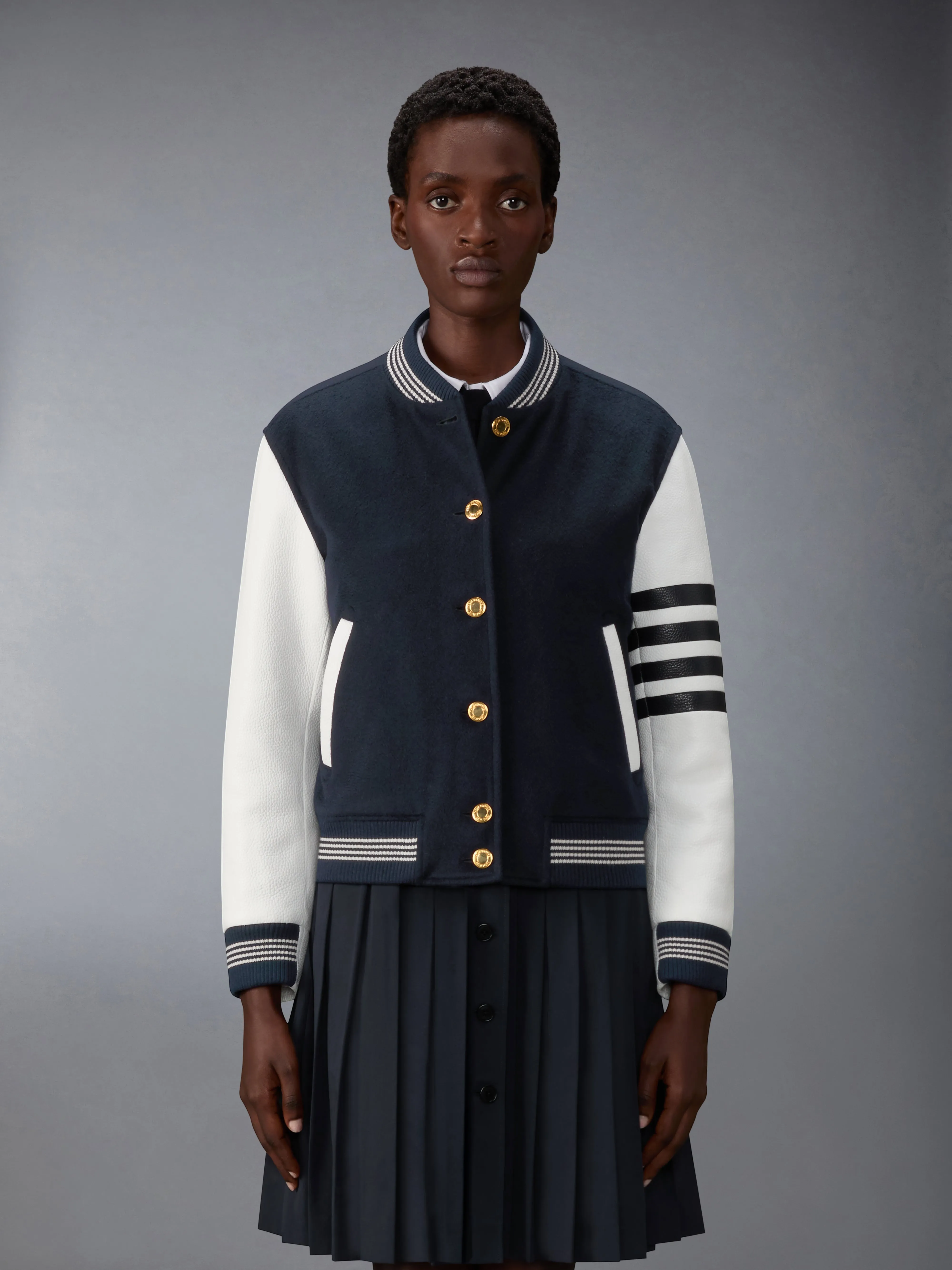 CASHMERE AND LEATHER BROWNE 65 VARSITY JACKET sold by Thom Browne