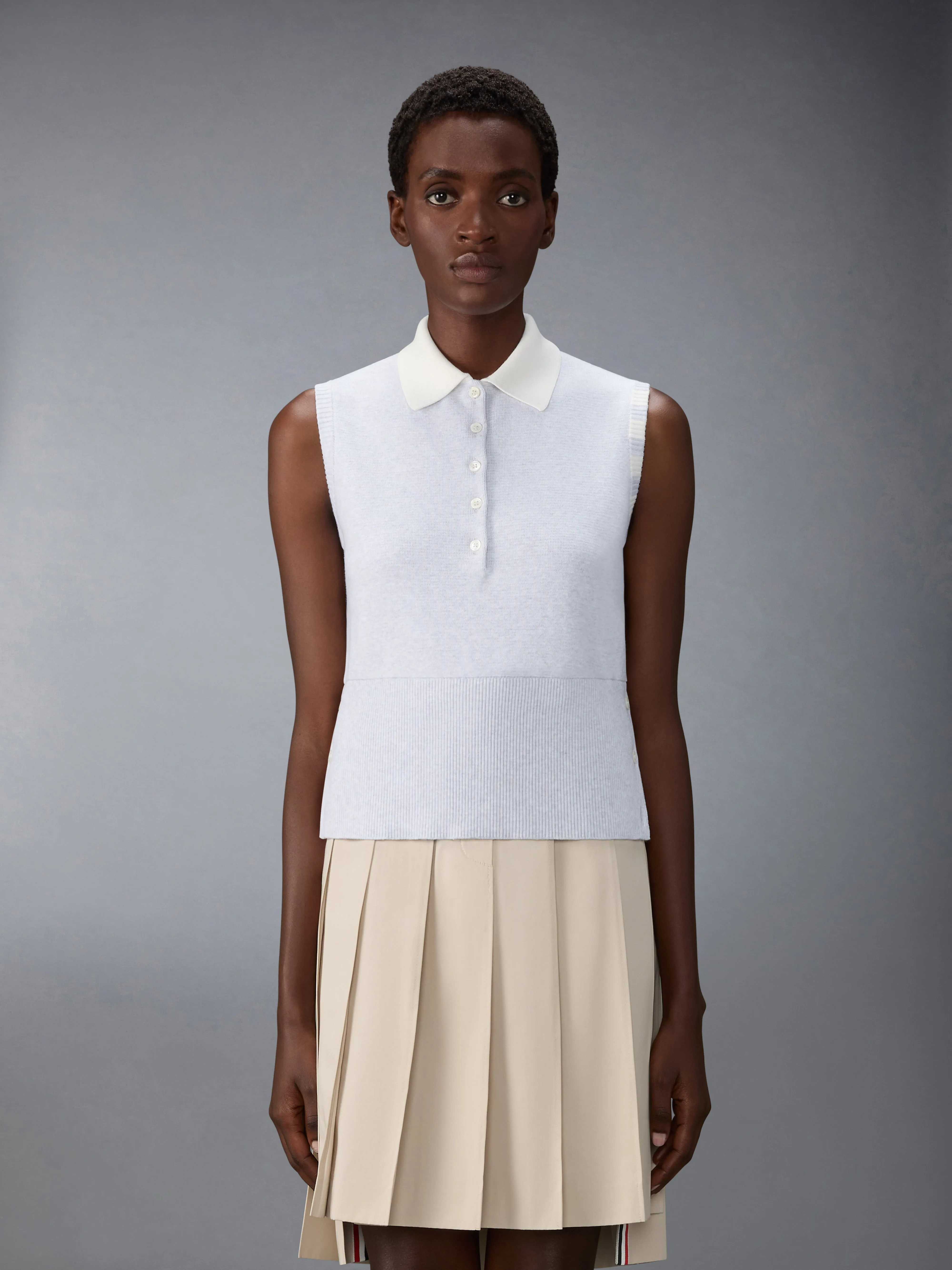 MILANO STITCH 4-BAR SLEEVELESS POLO sold by Thom Browne