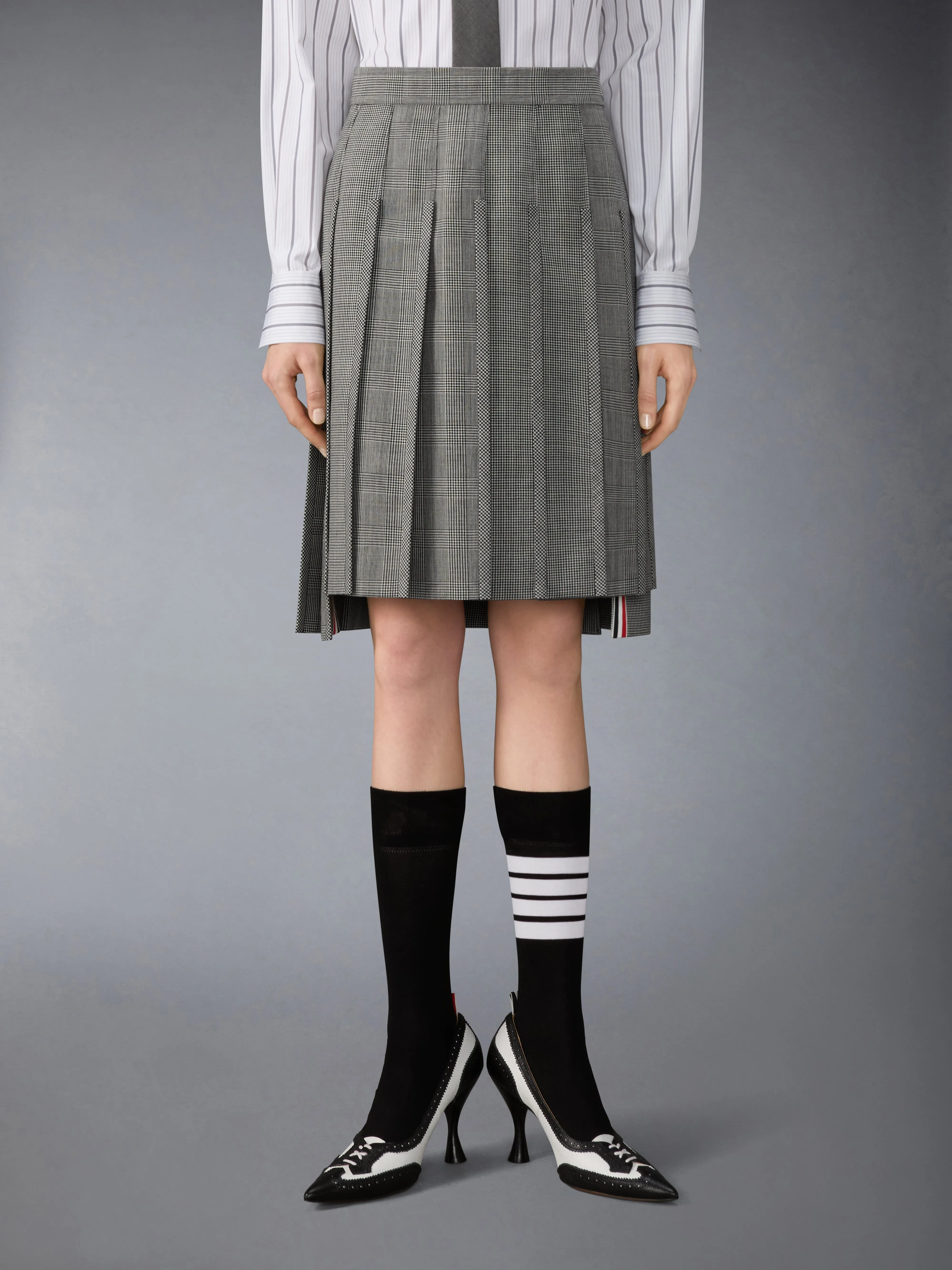 FUNMIX HOUNDSTOOTH FRESCO PLEATED SKIRT sold by Thom Browne