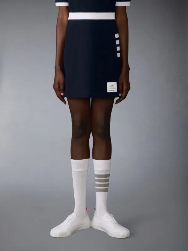 TEXTURED PIQUE 4-BAR BOX PLEAT MINI SKIRT sold by Thom Browne