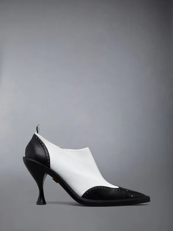 NAPPA LEATHER WINGTIP BOOTIE 90MM sold by Thom Browne