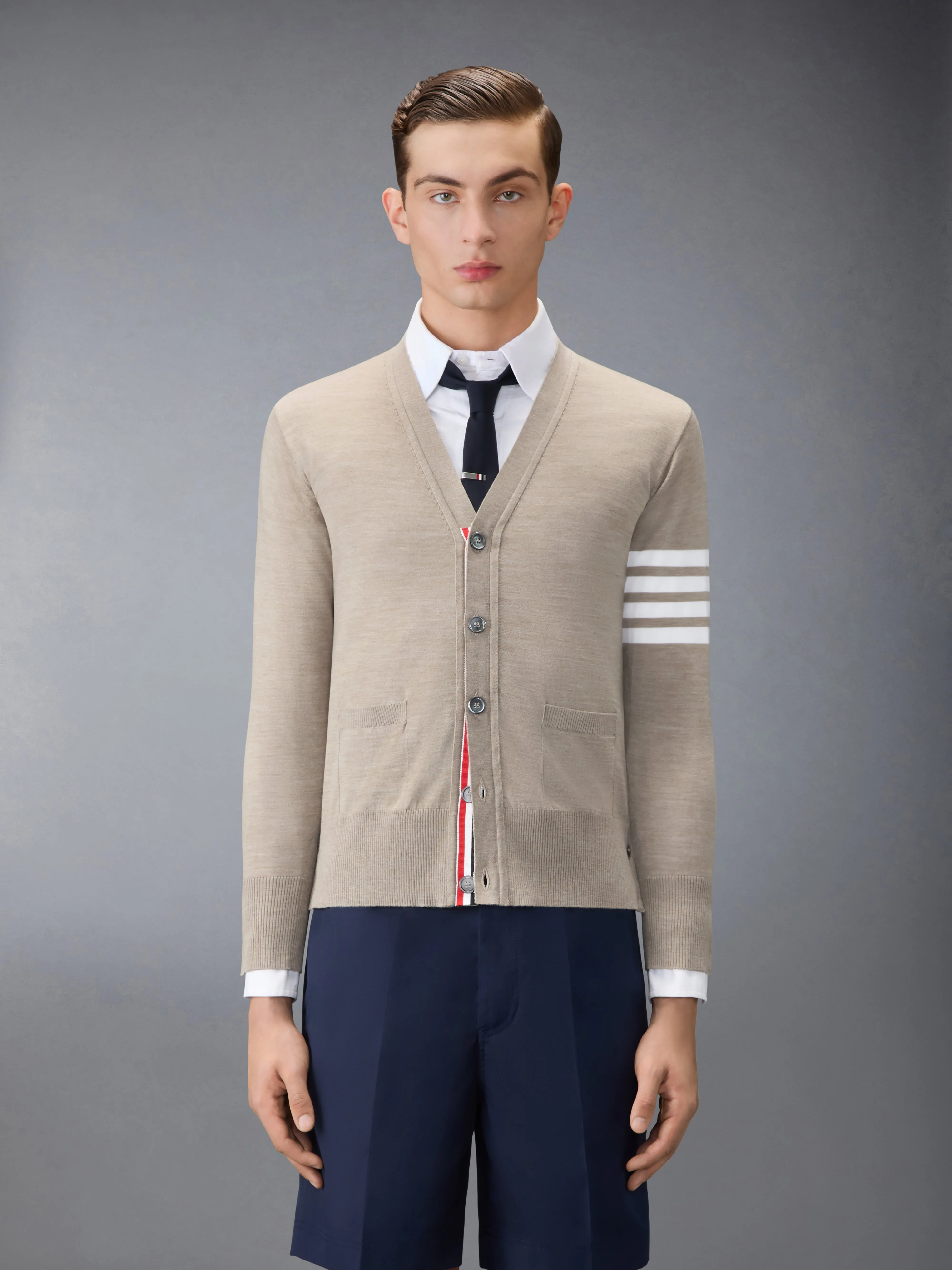 MERINO WOOL 4-BAR CLASSIC V-NECK CARDIGAN sold by Thom Browne