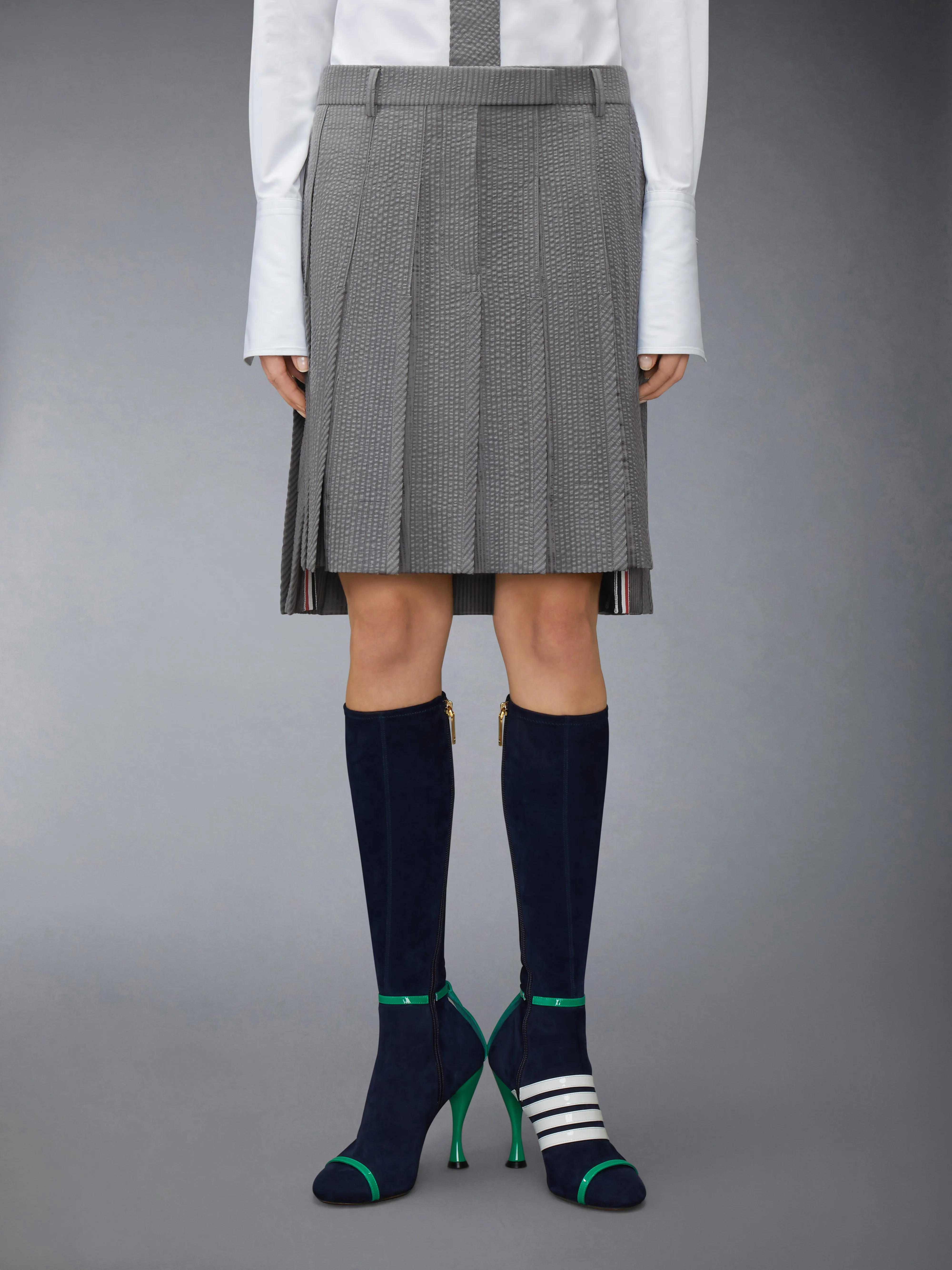 WOOL SEERSUCKER PLEATED LOW RISE PLEATED SKIRT sold by Thom Browne
