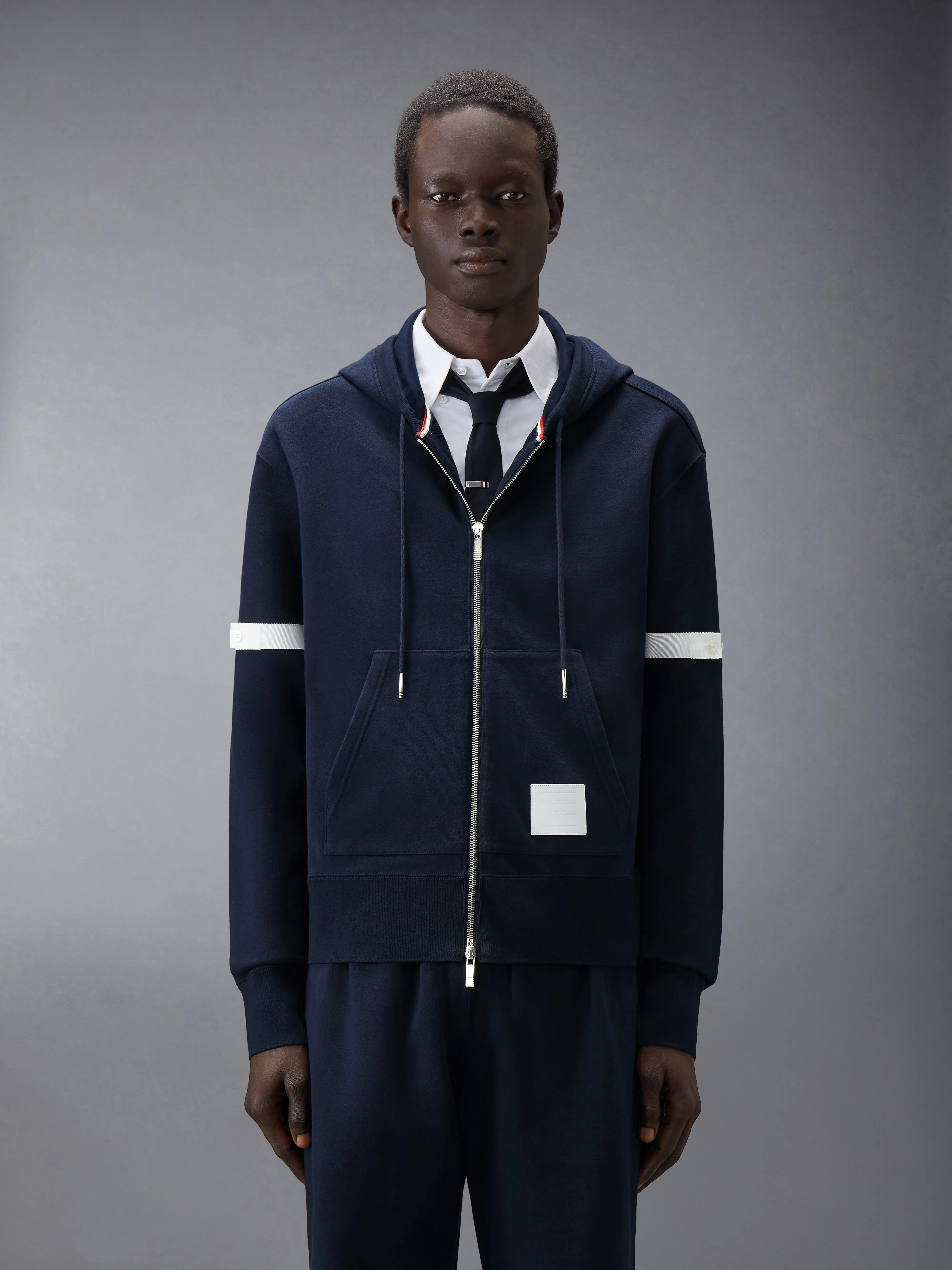 LOOPBACK JERSEY ARMBAND RELAXED ZIP UP HOODIE sold by Thom Browne