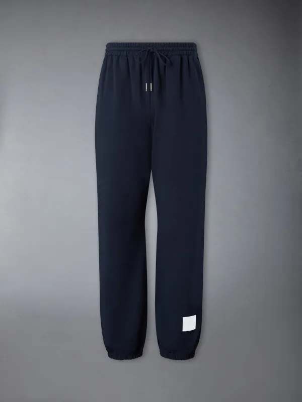 LOOPBACK JERSEY RELAXED SWEATPANTS sold by Thom Browne