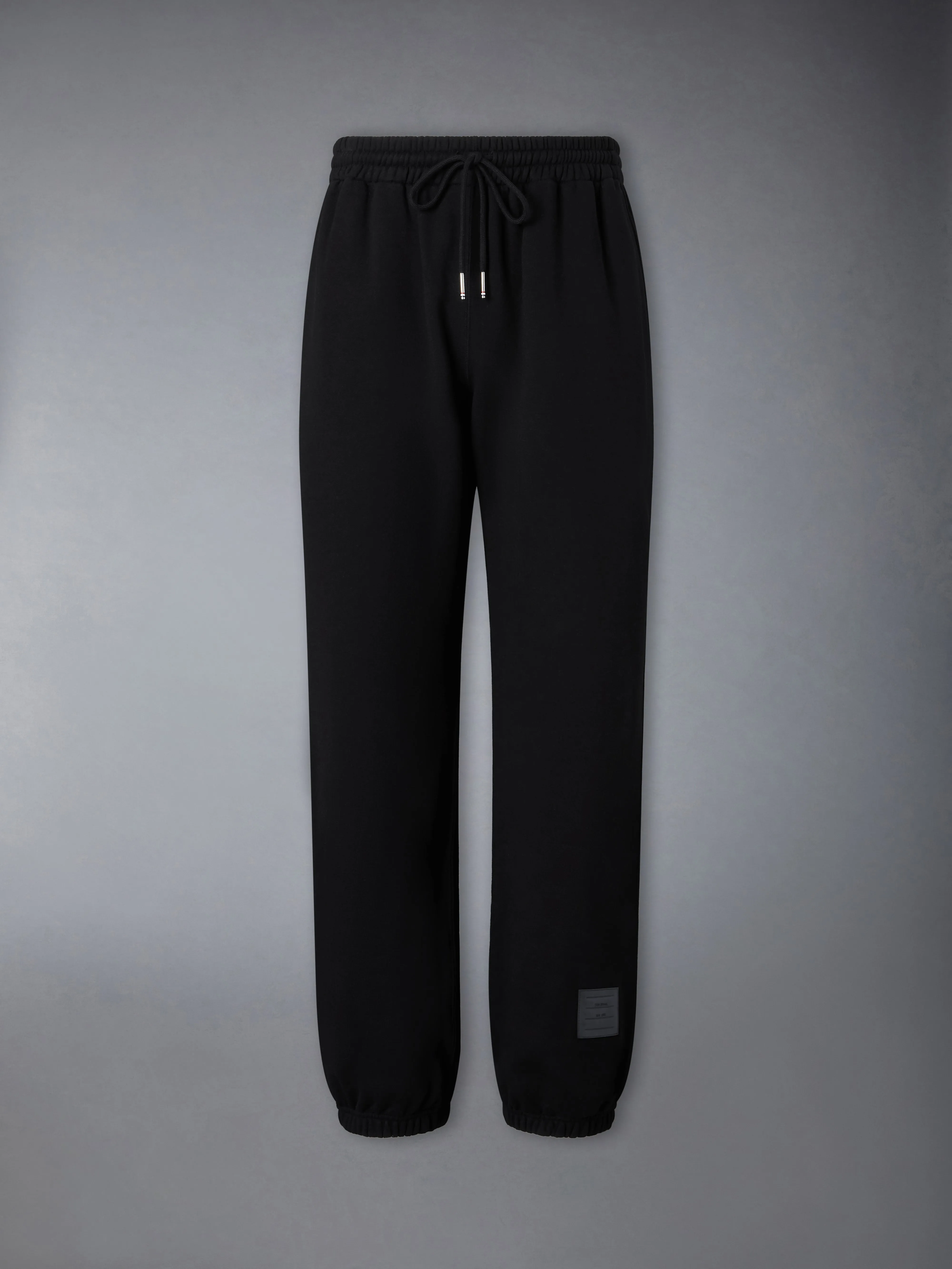 LOOPBACK JERSEY RELAXED SWEATPANTS sold by Thom Browne