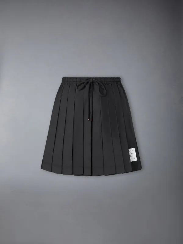 RIPSTOP PLEATED MINI SKIRT sold by Thom Browne