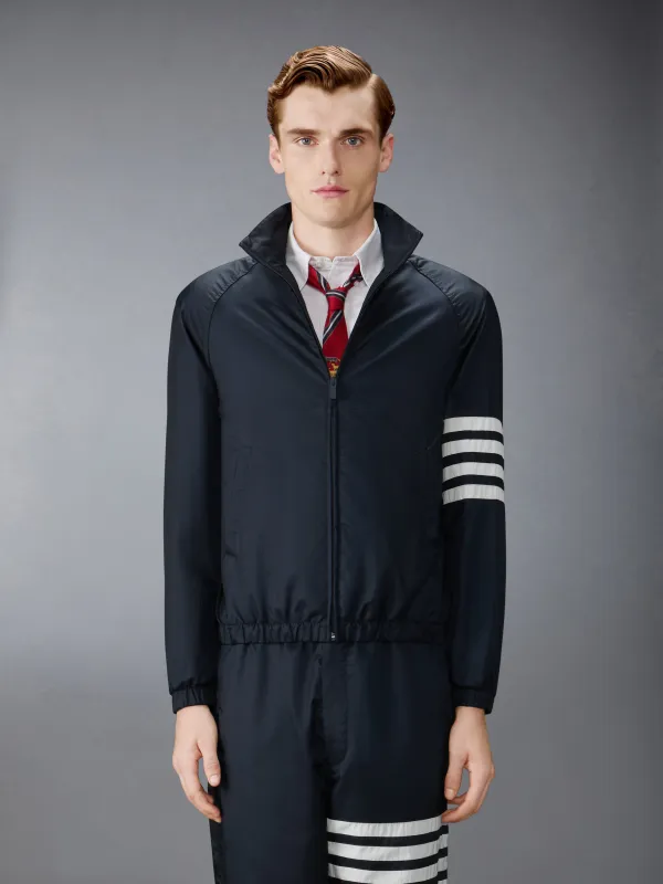 SHINY RIPSTOP RAGLAN 4-BAR TRACK JACKET made by Thom Browne