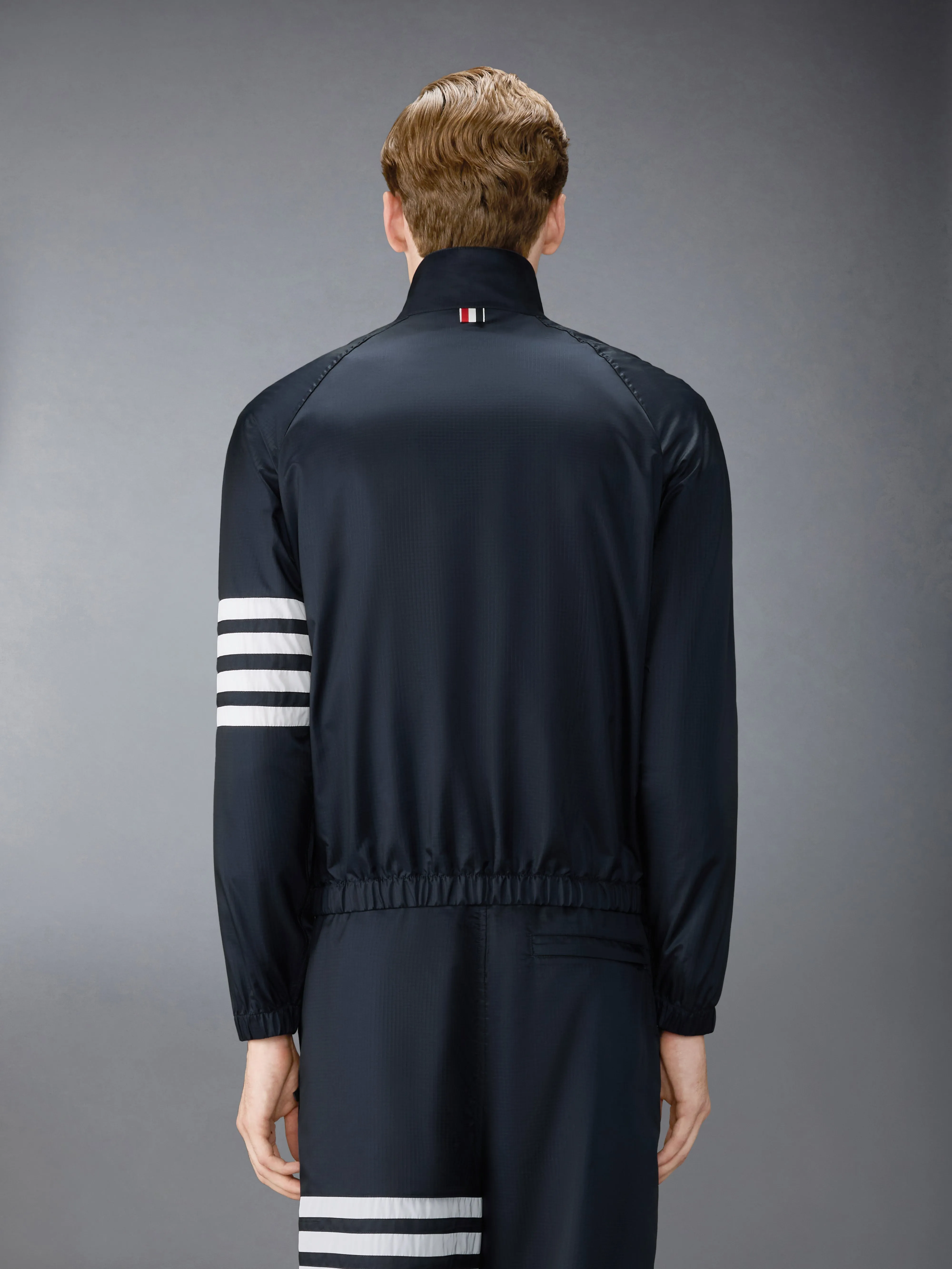 SHINY RIPSTOP RAGLAN 4-BAR TRACK JACKET sold by Thom Browne product image thumbnail 2