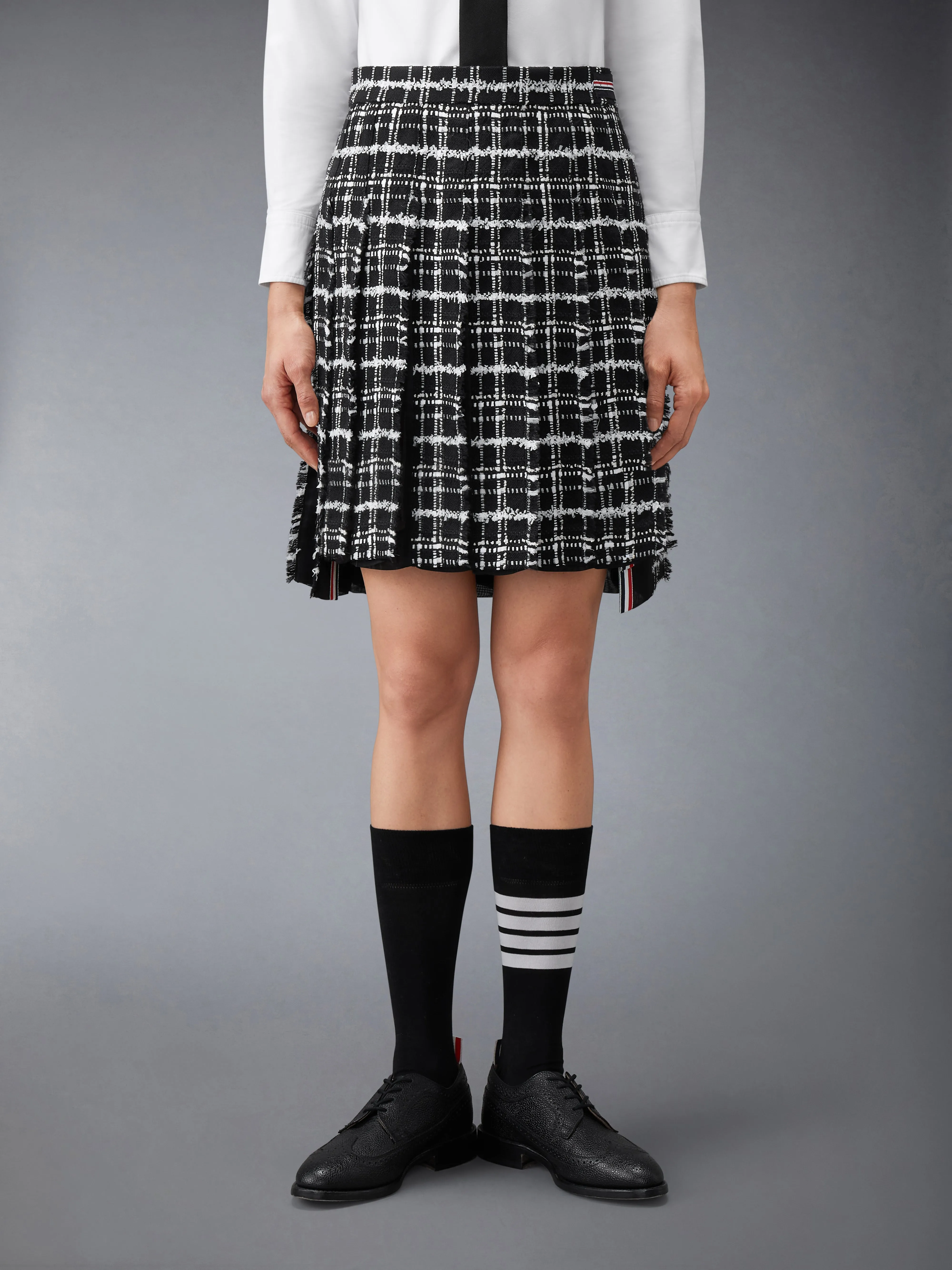 RIBBON TWEED PLEATED SKIRT WITH FRAY EDGE sold by Thom Browne product image thumbnail 2