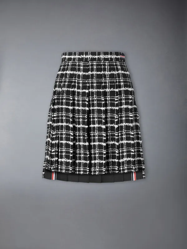 RIBBON TWEED PLEATED SKIRT WITH FRAY EDGE made by Thom Browne