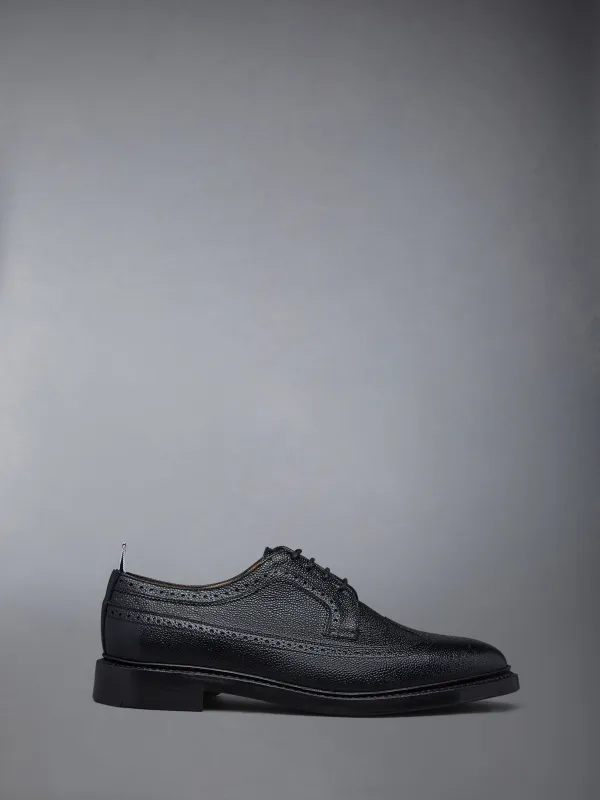 PEBBLE LUCIDO LEATHER SOLE LONGWING BROGUE sold by Thom Browne