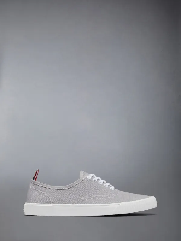 CANVAS VULCANIZED SOLE HERITAGE SNEAKERS sold by Thom Browne
