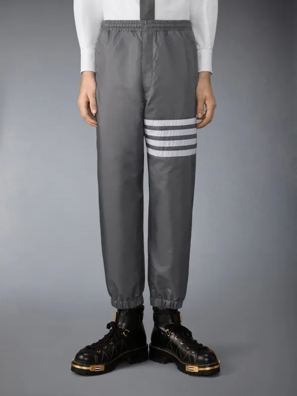 SHINY RIPSTOP 4-BAR TRACK PANTS made by Thom Browne