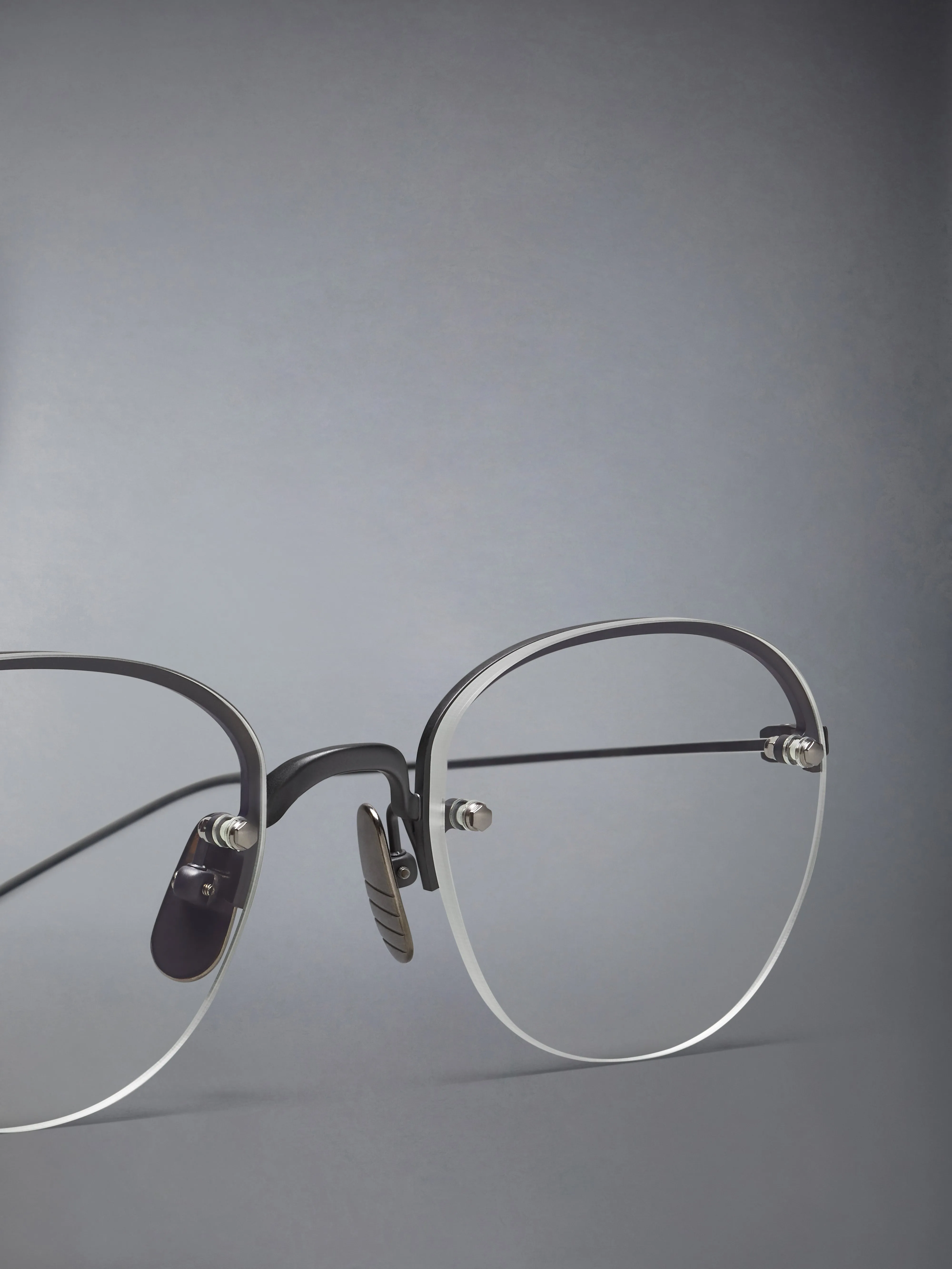 TITANIUM SEMI RIMLESS OVAL EYEGLASSES sold by Thom Browne product image thumbnail 3