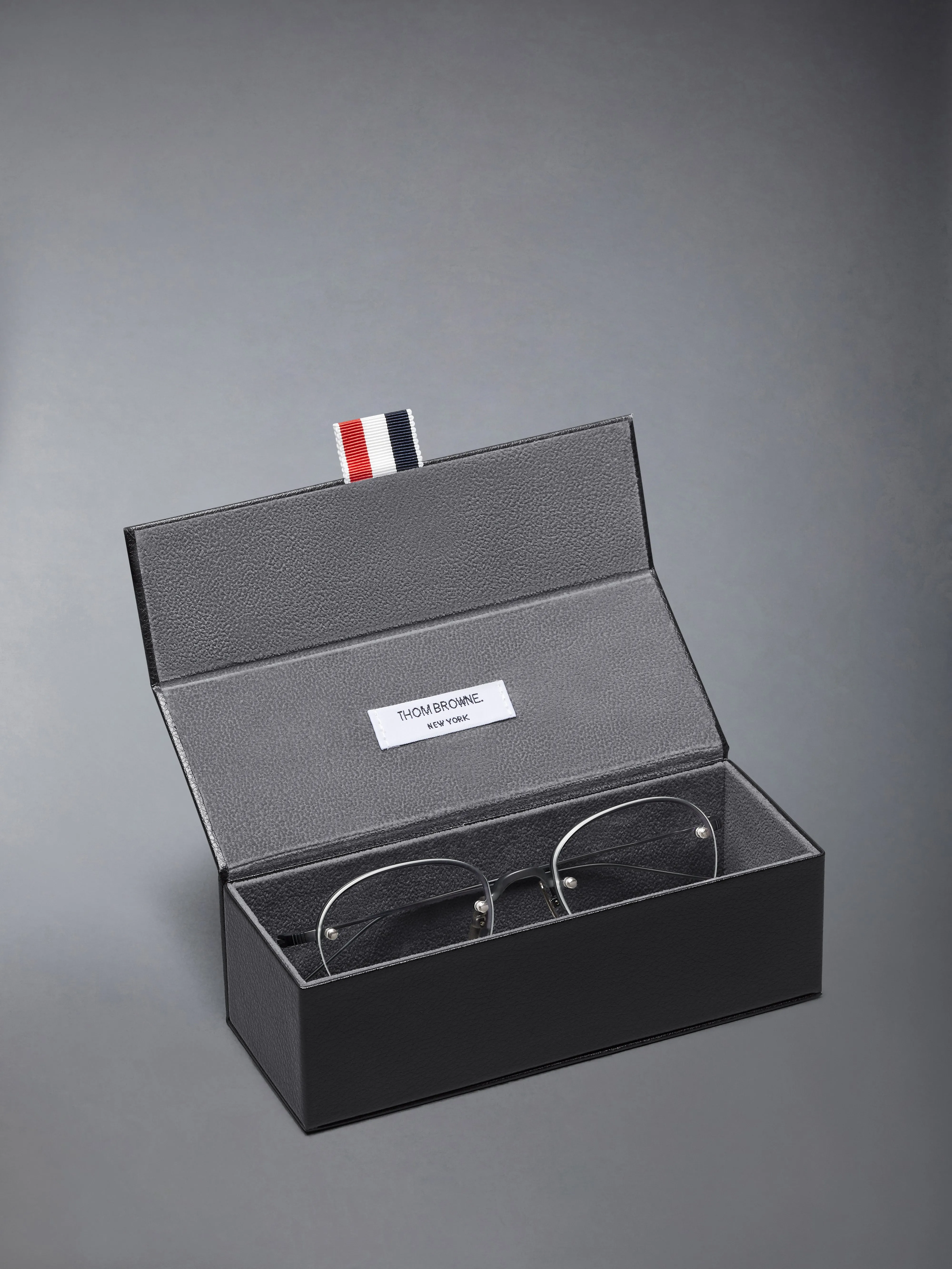 TITANIUM SEMI RIMLESS OVAL EYEGLASSES sold by Thom Browne product image thumbnail 4