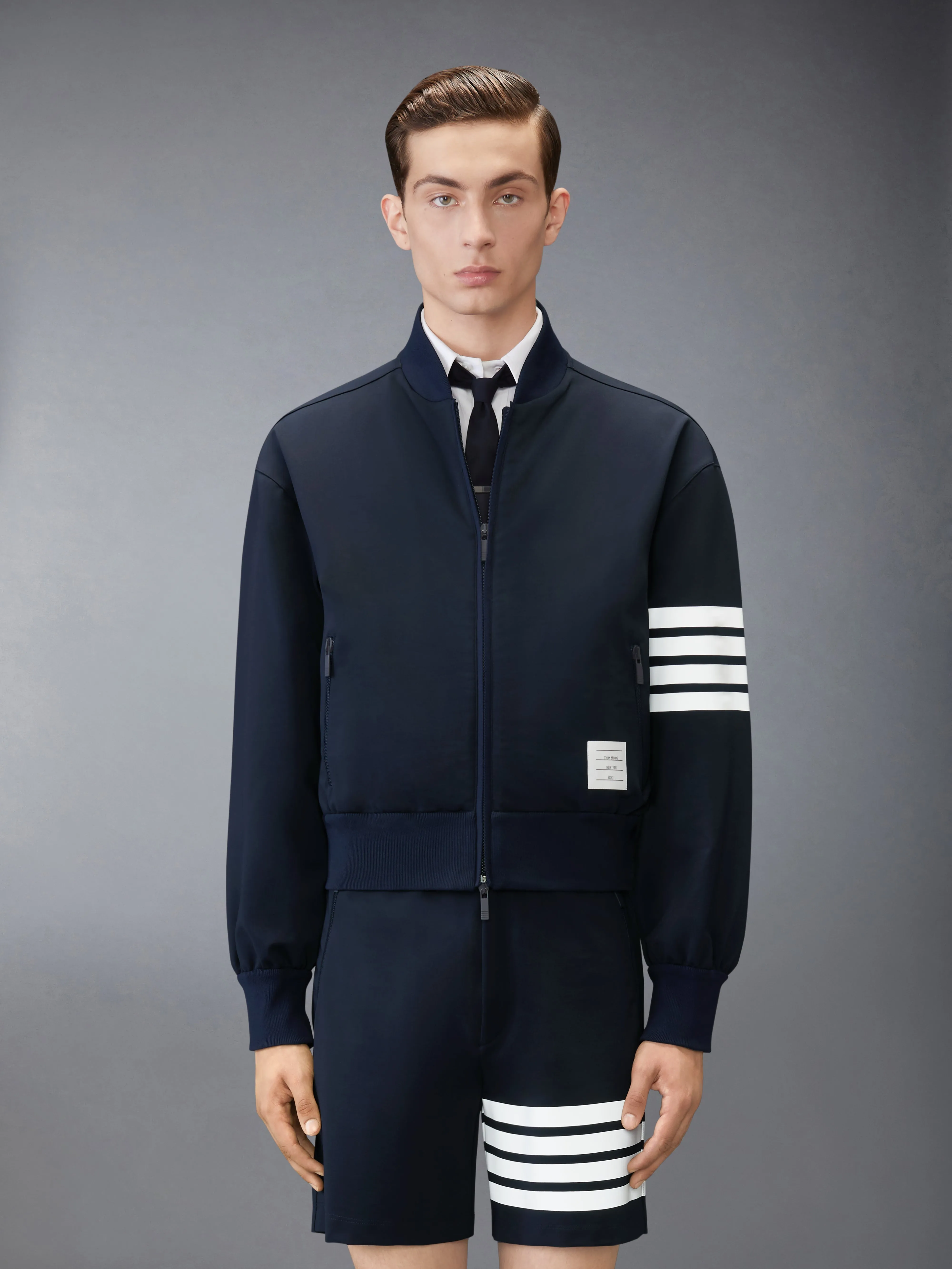 3M REFLECTIVE 4-BAR TECH BOMBER sold by Thom Browne
