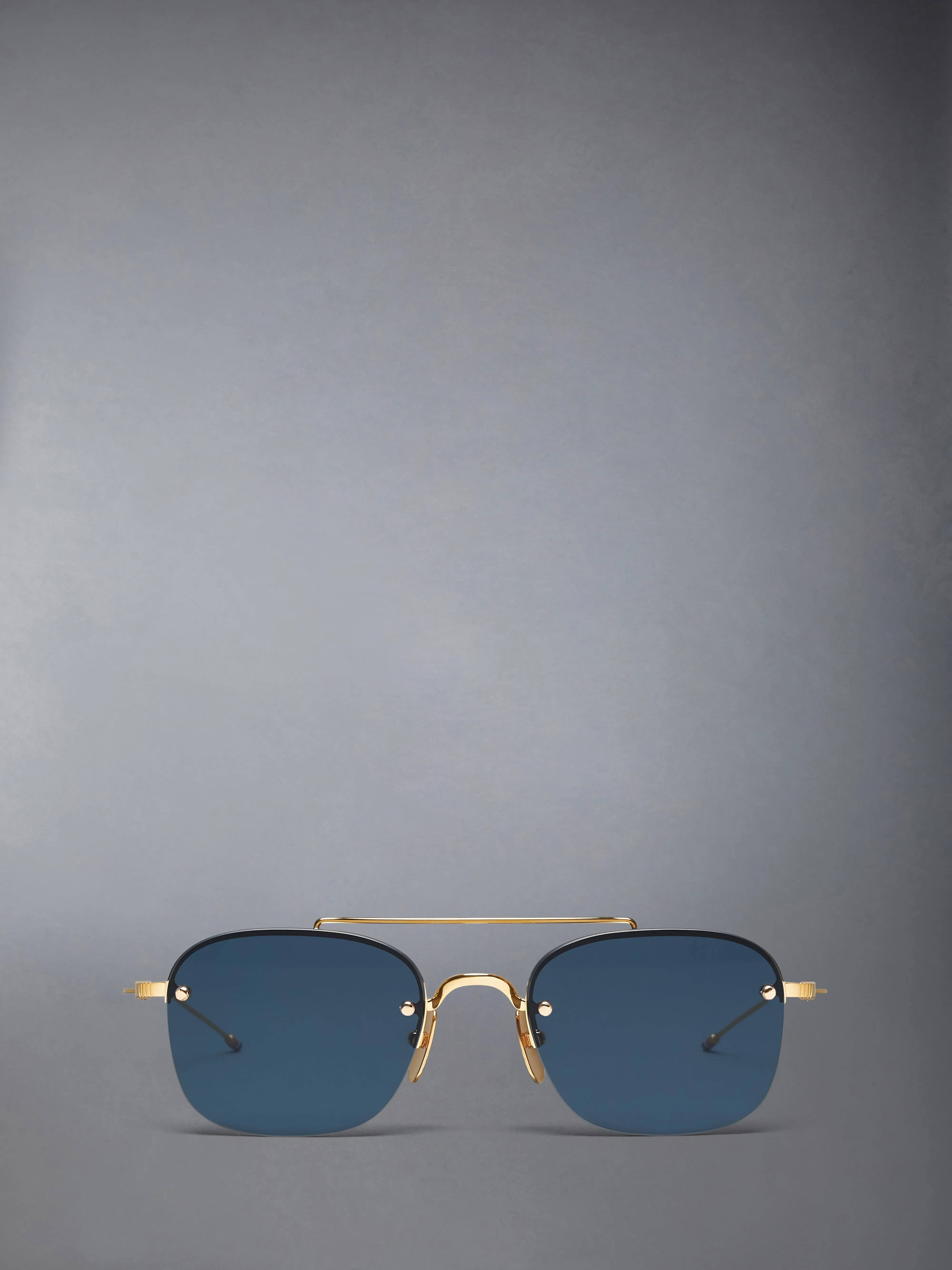 TITANIUM SEMI RIMLESS PILOT SUNGLASSES sold by Thom Browne