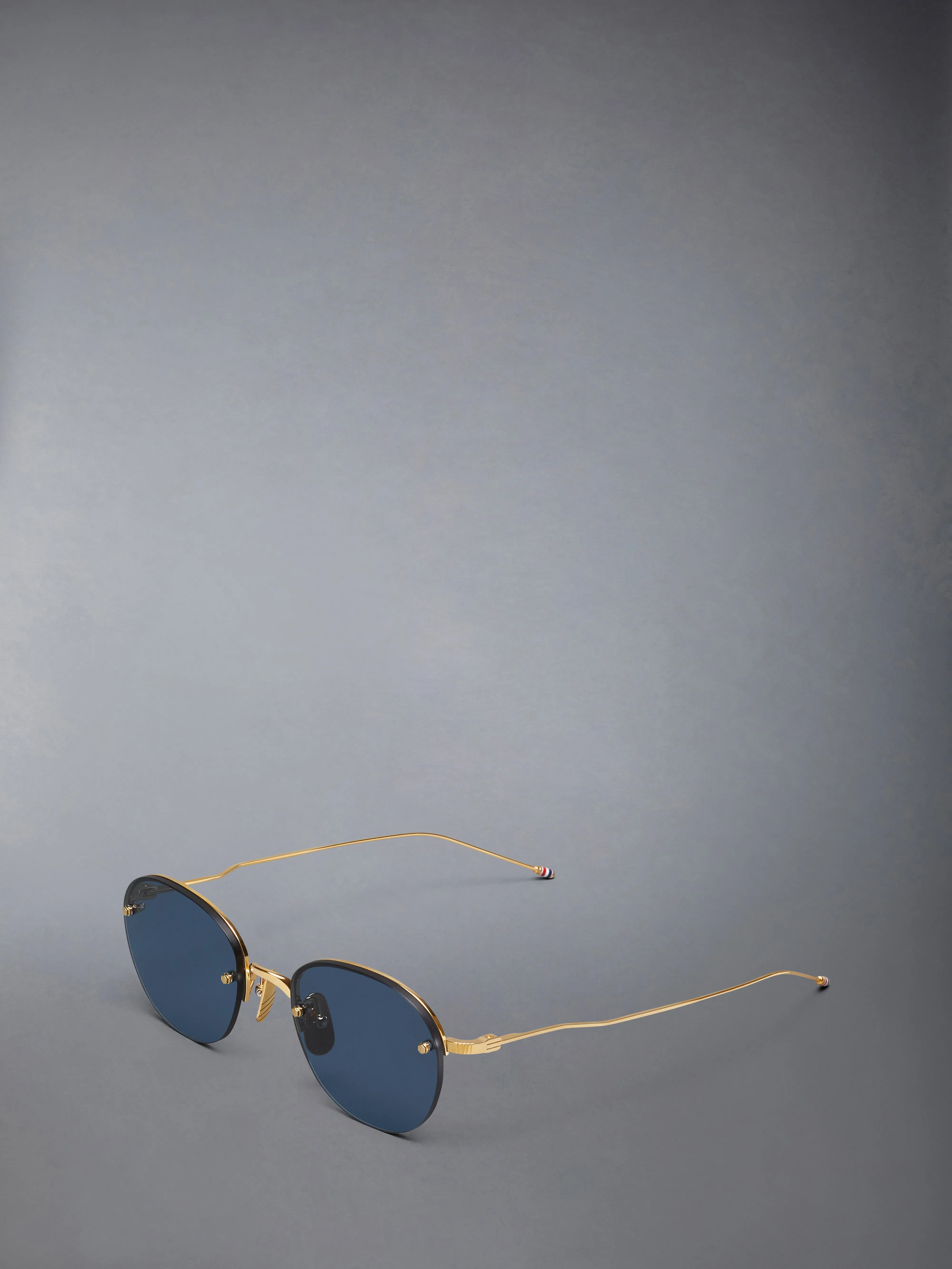 TITANIUM SEMI RIMLESS OVAL SUNGLASSES sold by Thom Browne product image thumbnail 2