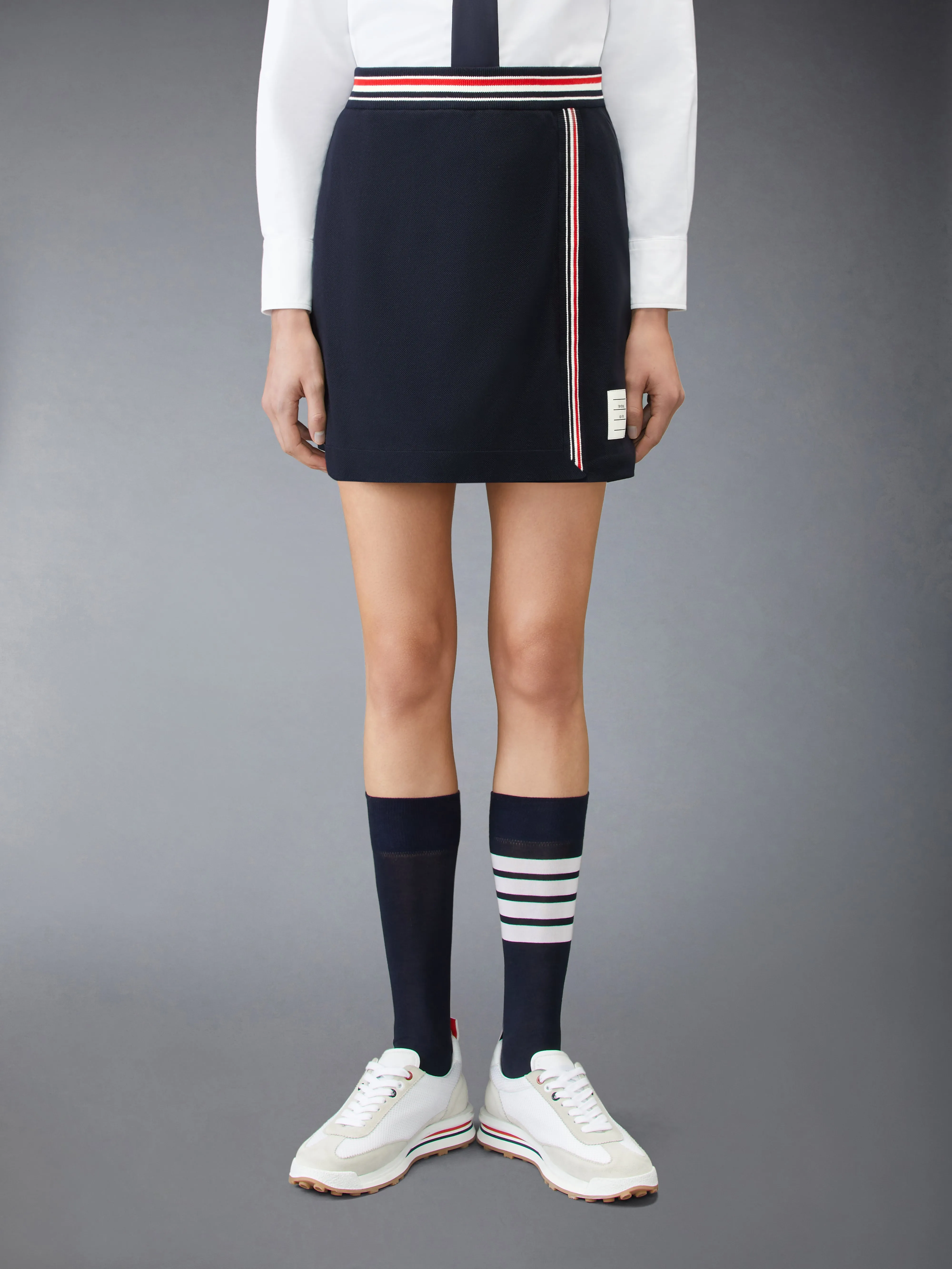 PIQUE RWB TRIM WRAP SKIRT sold by Thom Browne